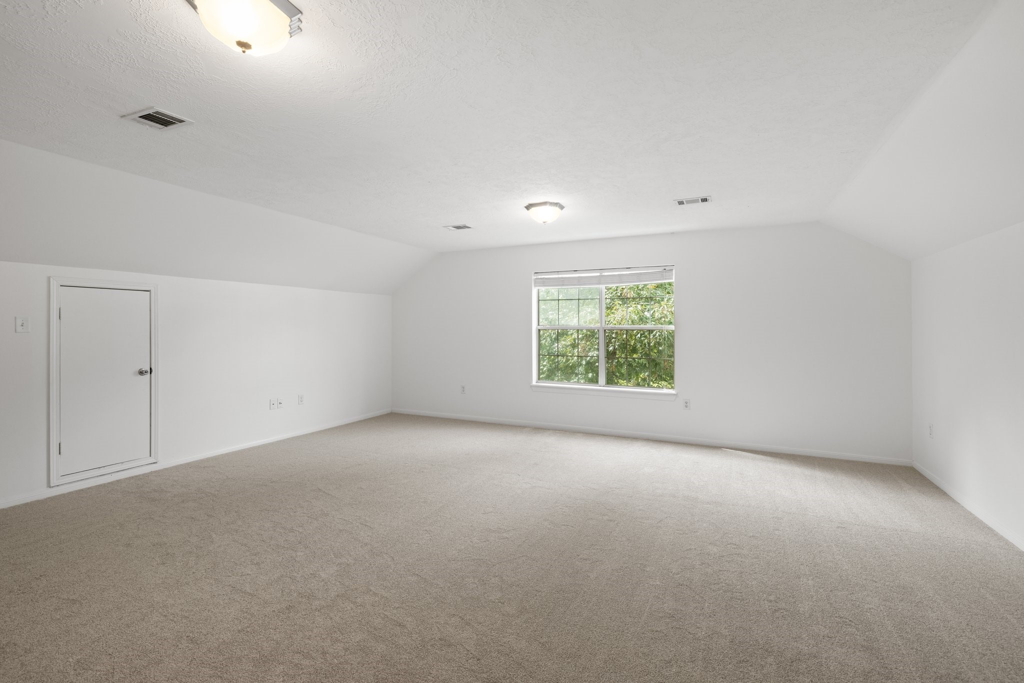 This versatile upstairs room offers endless possibilitiesideal as an extra bedroom, game room, or workout space to suit your family's needs.