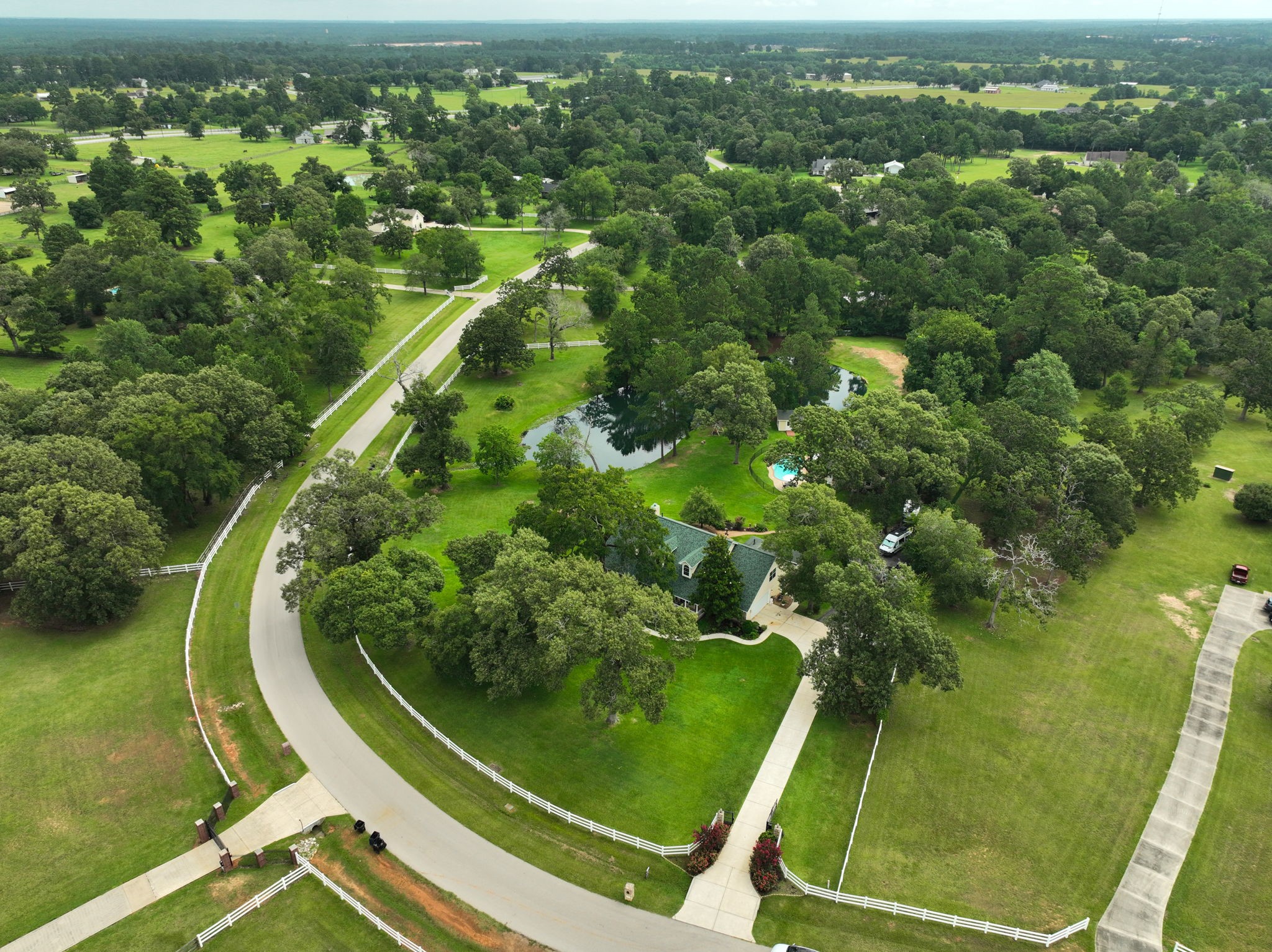 Stunning aerial view showcasing the sprawling layout and natural beauty of the property.