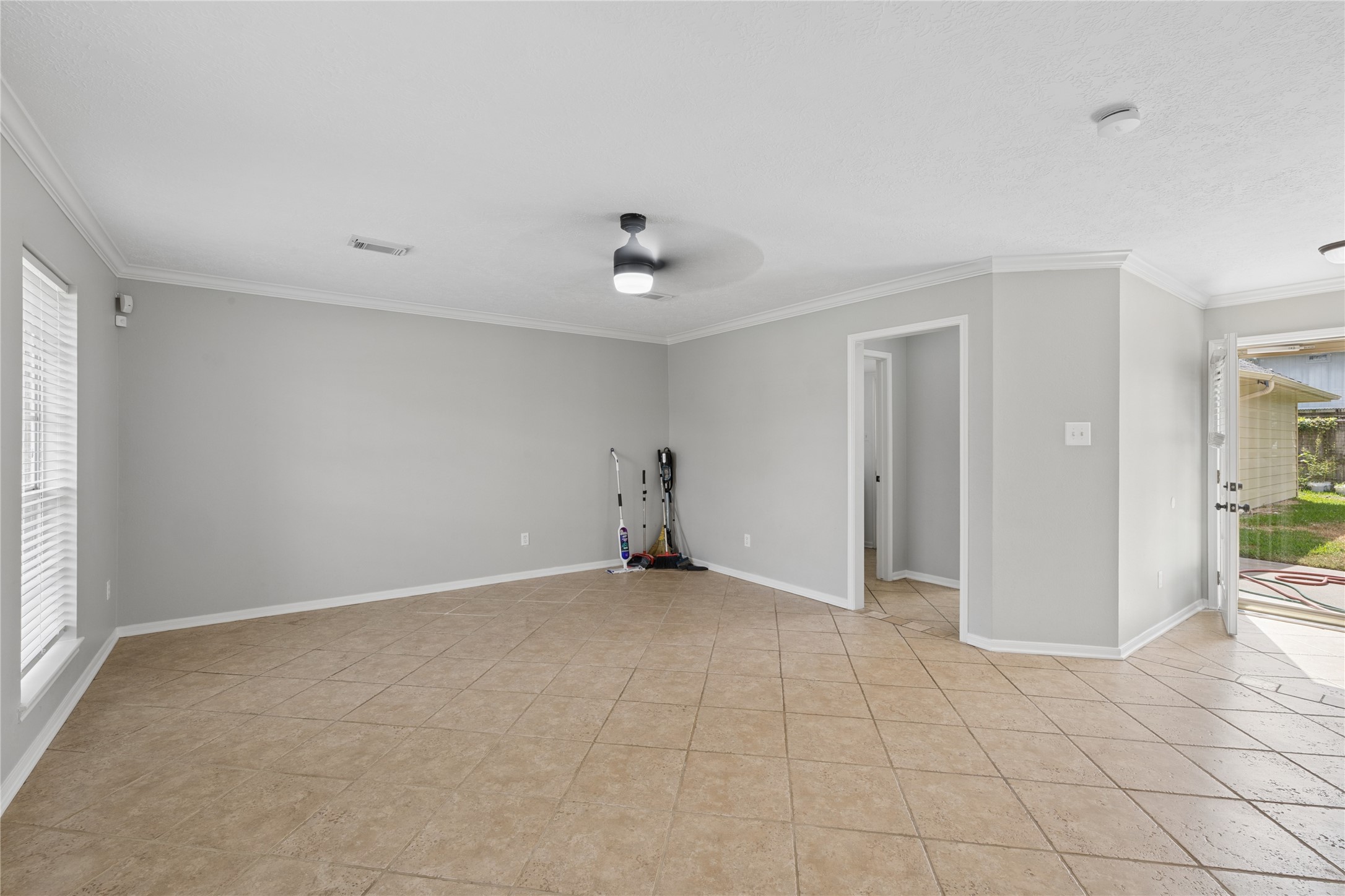 Den next to Laundry Room & half bathroom