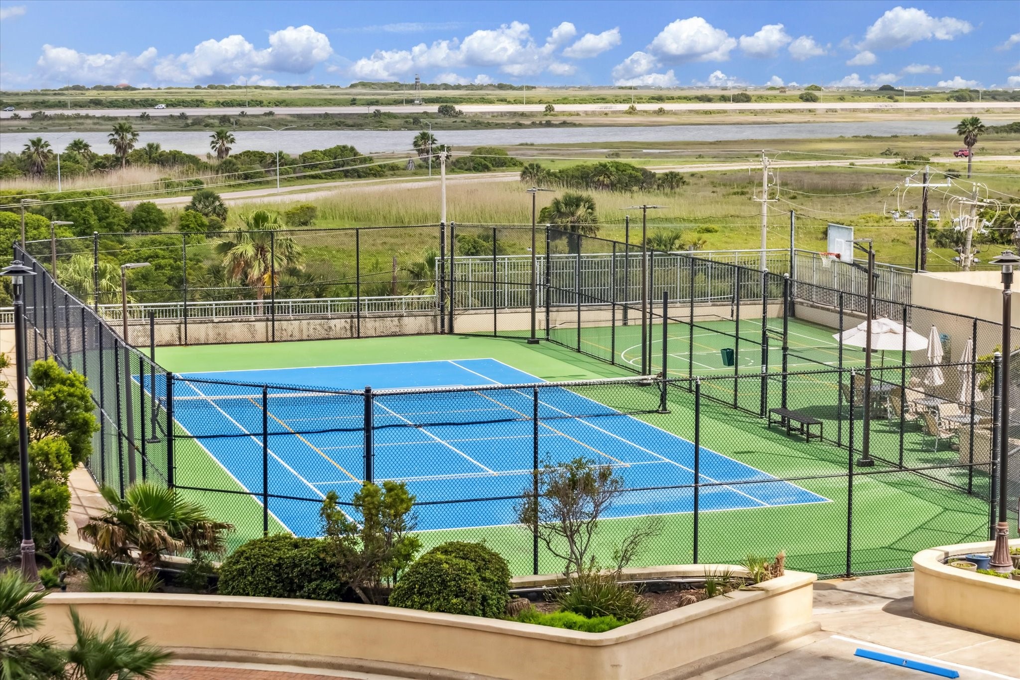 Tennis, pickleball, and basketball courts offer residents plenty of ways to stay active, play together, and enjoy the outdoors