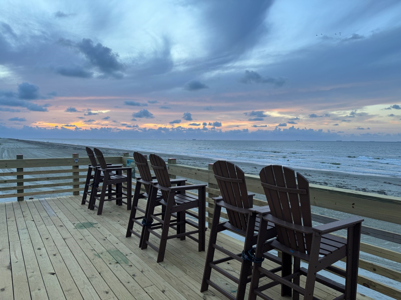 At the end of the dune walkover, the observation deck offers a peaceful place to unwind, watch the waves, and take in a spectacular coastal sunset.