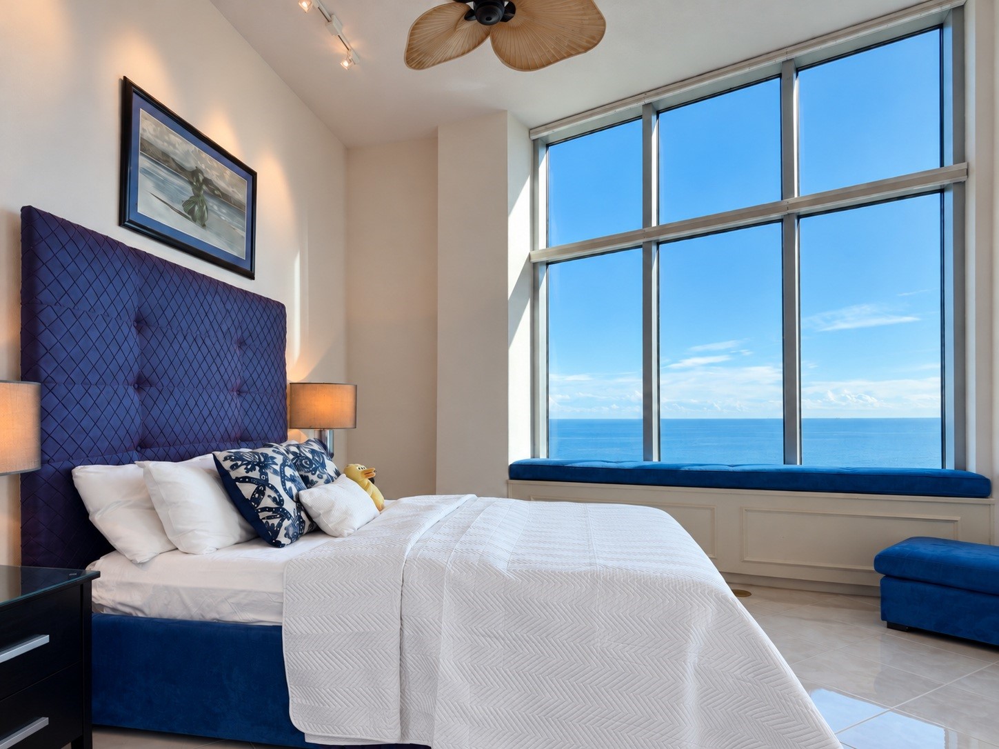 Spacious second primary suite with 11'4? penthouse ceilings, beach views and direct access to the beach balcony.
