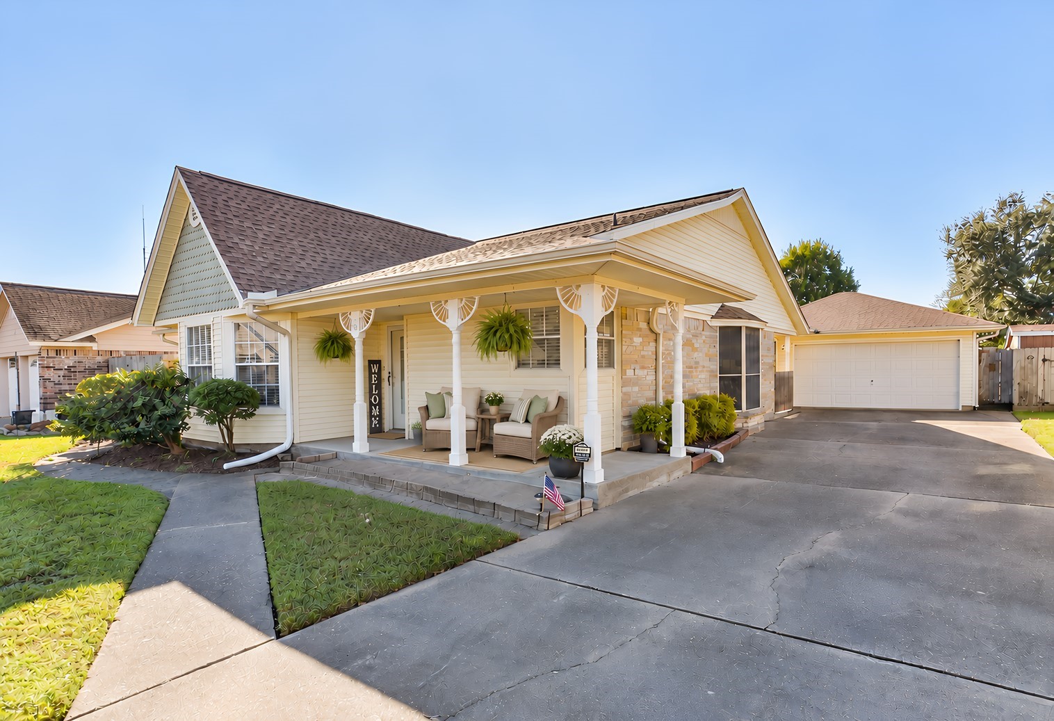 This staged front porch is a perfect place to spend quiet mornings with a cup of coffee, or after a long day at work,  you can unwind in the cool evening watching the sun go down.