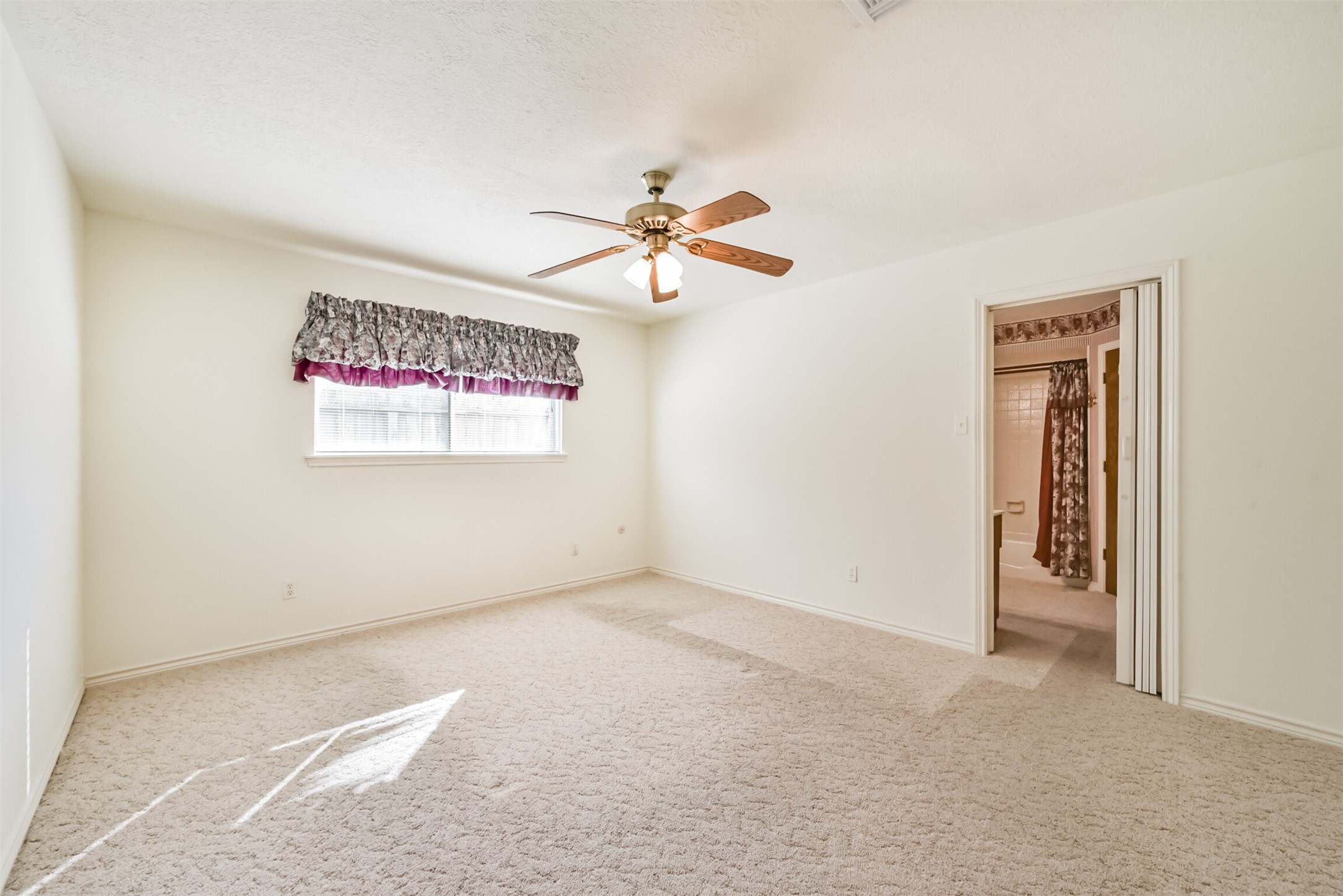 Imagine the possibilities! This spacious primary bedroom is a blank canvas ready for your personal touch. With new flooring and a fresh, modern update, you can transform this space into the private retreat youve always envisioned. Bring your ideas and creativity to make it your own!