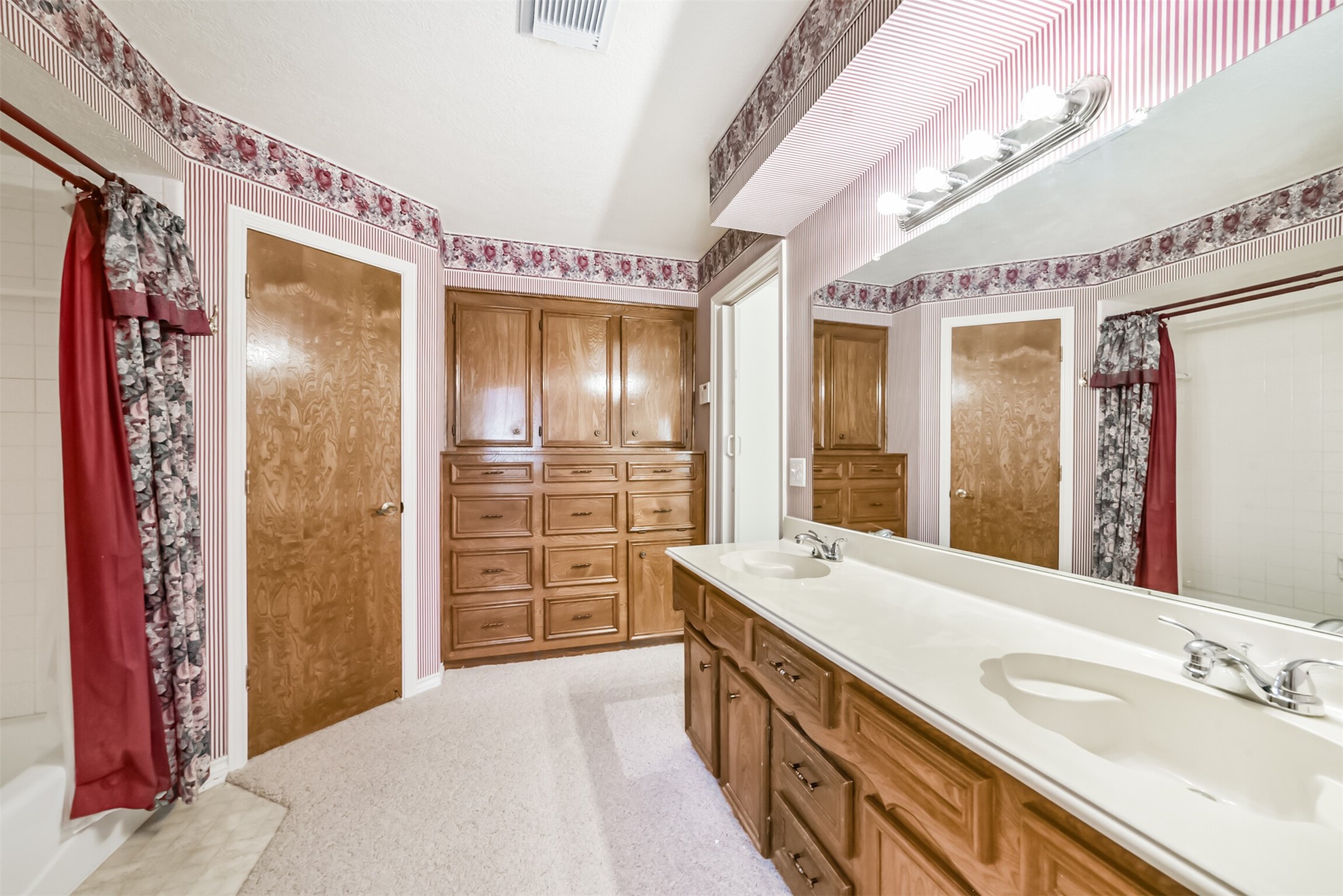The handcrafted built-in drawers and cabinets reflect quality workmanship and thoughtful design, offering abundant space to keep your essentials organized and close at hand. With functionality and timeless craftsmanship in mind, these beautiful built-ins add both character and convenience to your daily routine.