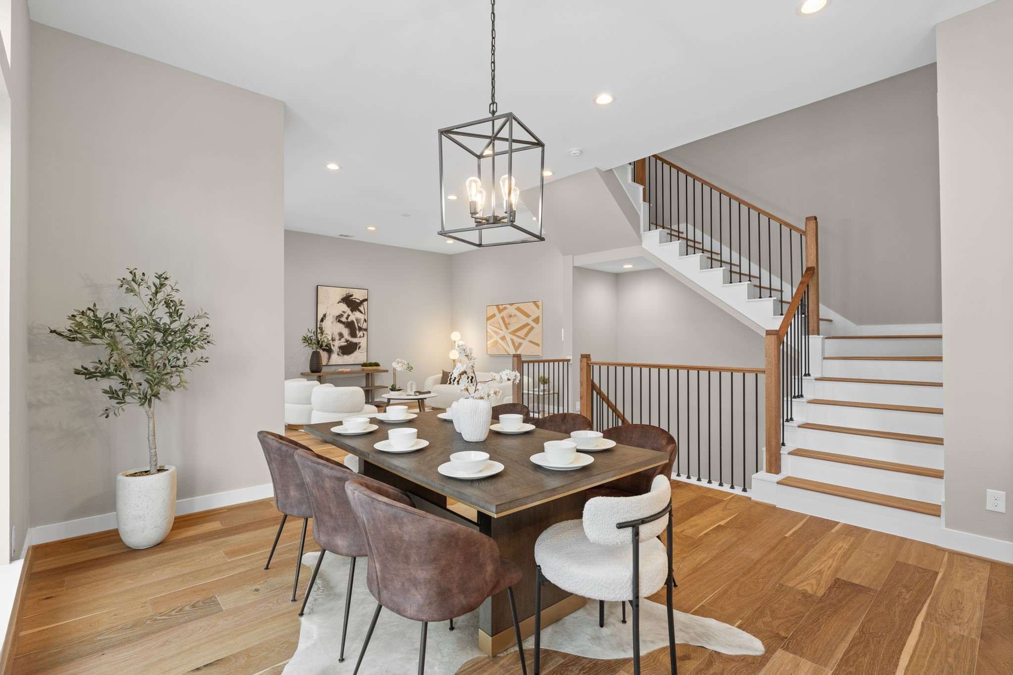Designated dining area with inviting open floor plan to living area
