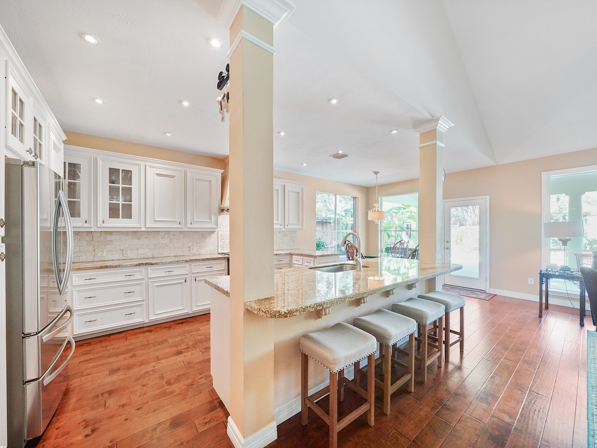 Pull up a seat at the breakfast bar for morning coffee, an afternoon snack, or conversation while dinner comes together. Its connection to the family room makes gathering feel effortless.