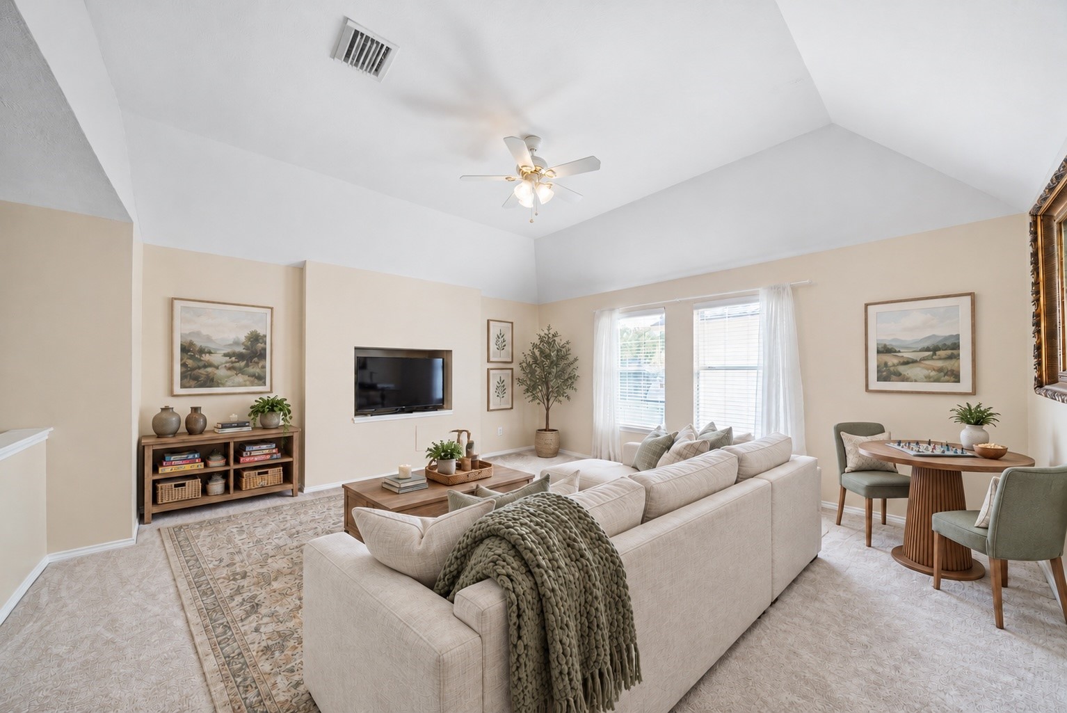 Virtually Staged: The upstairs game room offers a welcoming place to gather, whether youre settling in for a movie night or enjoying a little friendly competition over your favorite board games.
