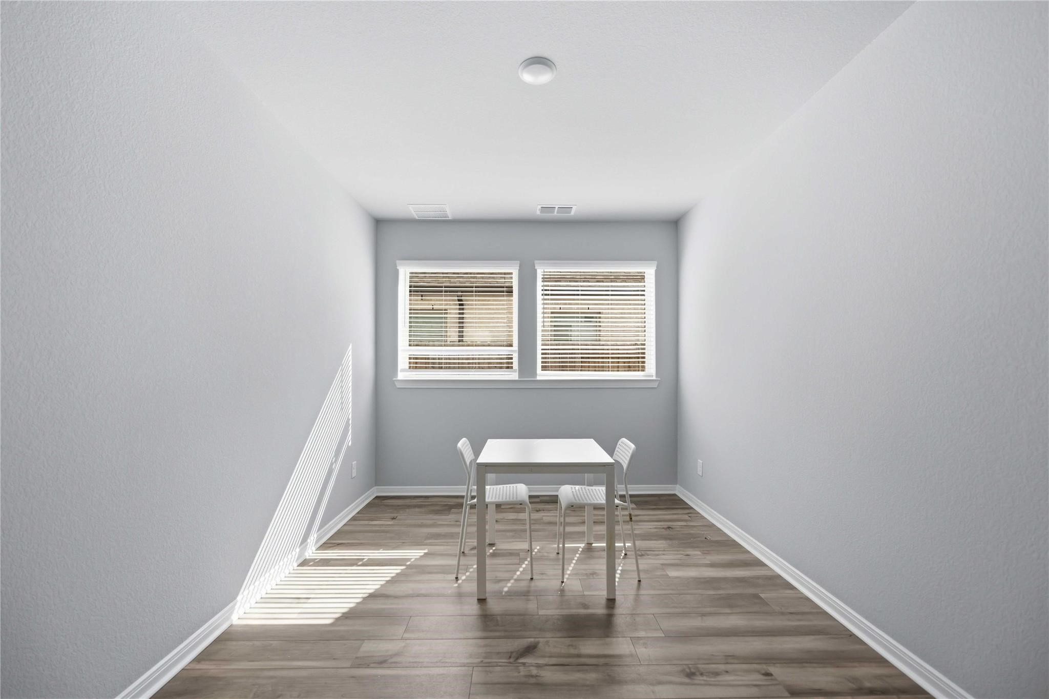 Kid's playroom, study/private office on 1st floor. Virtually staged.