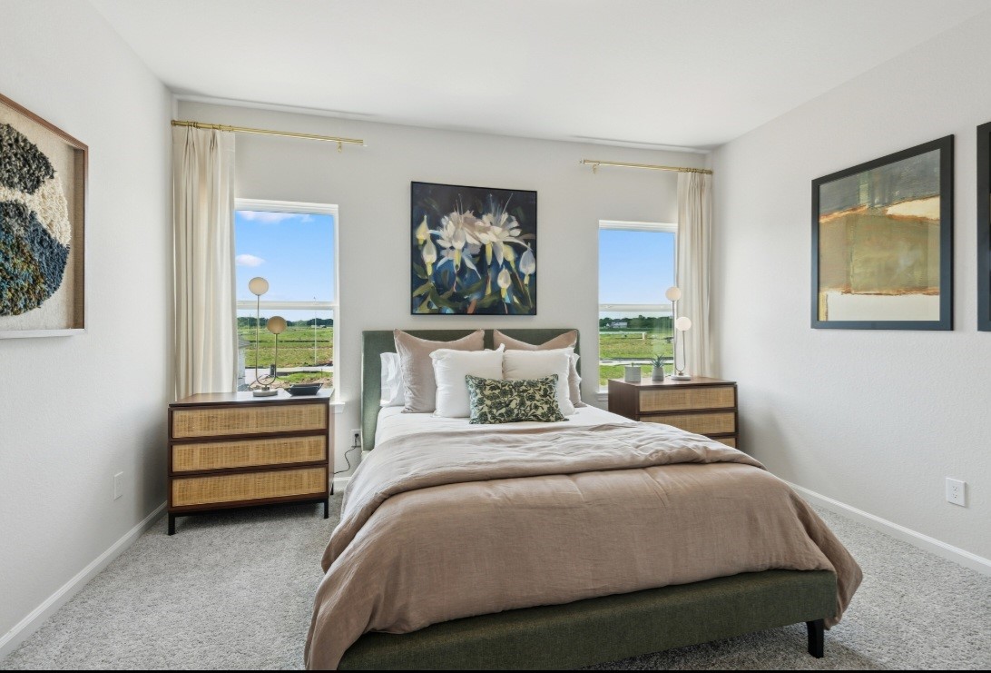 This image of the secondary bedroom is staged to be used for illustration purposes only.