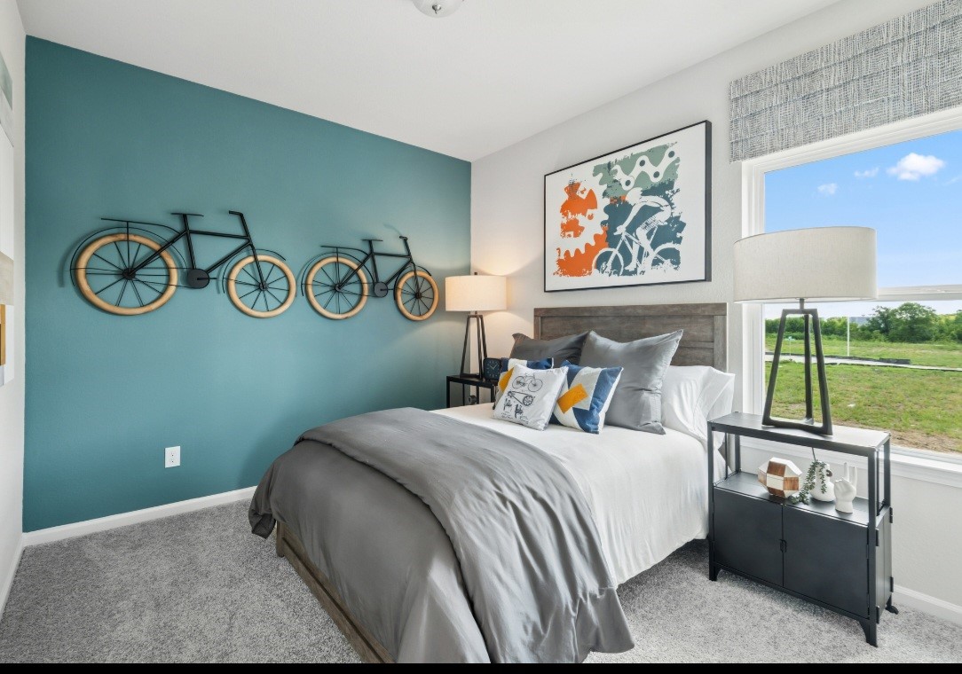 This image of the secondary bedroom is staged to be used for illustration purposes only.