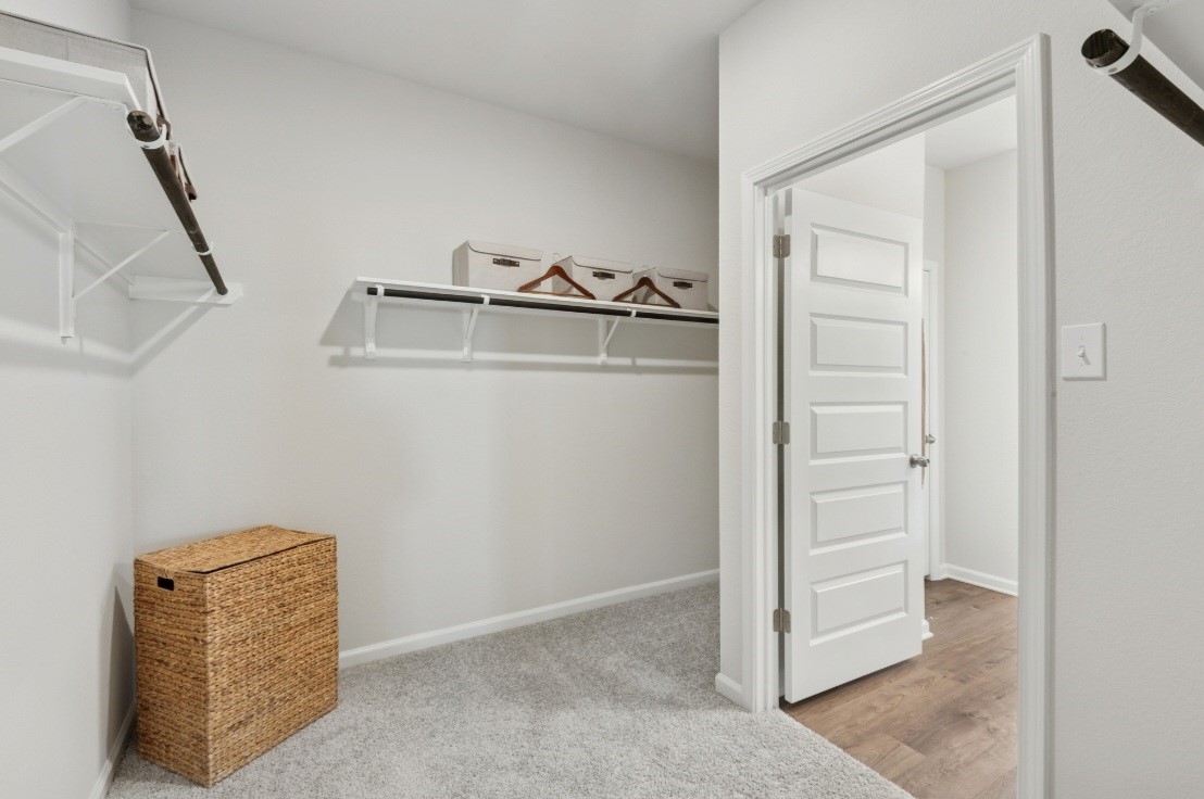 This image of the owners closet is staged to be used for illustration purposes only.