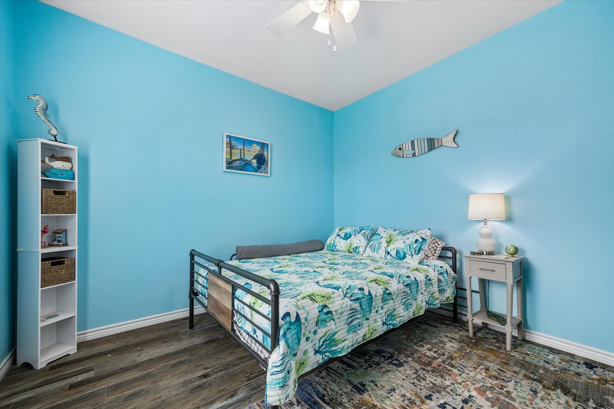 Experience coastal charm in Bedroom 2, featuring a vibrant design and the convenience of an en suite bath.