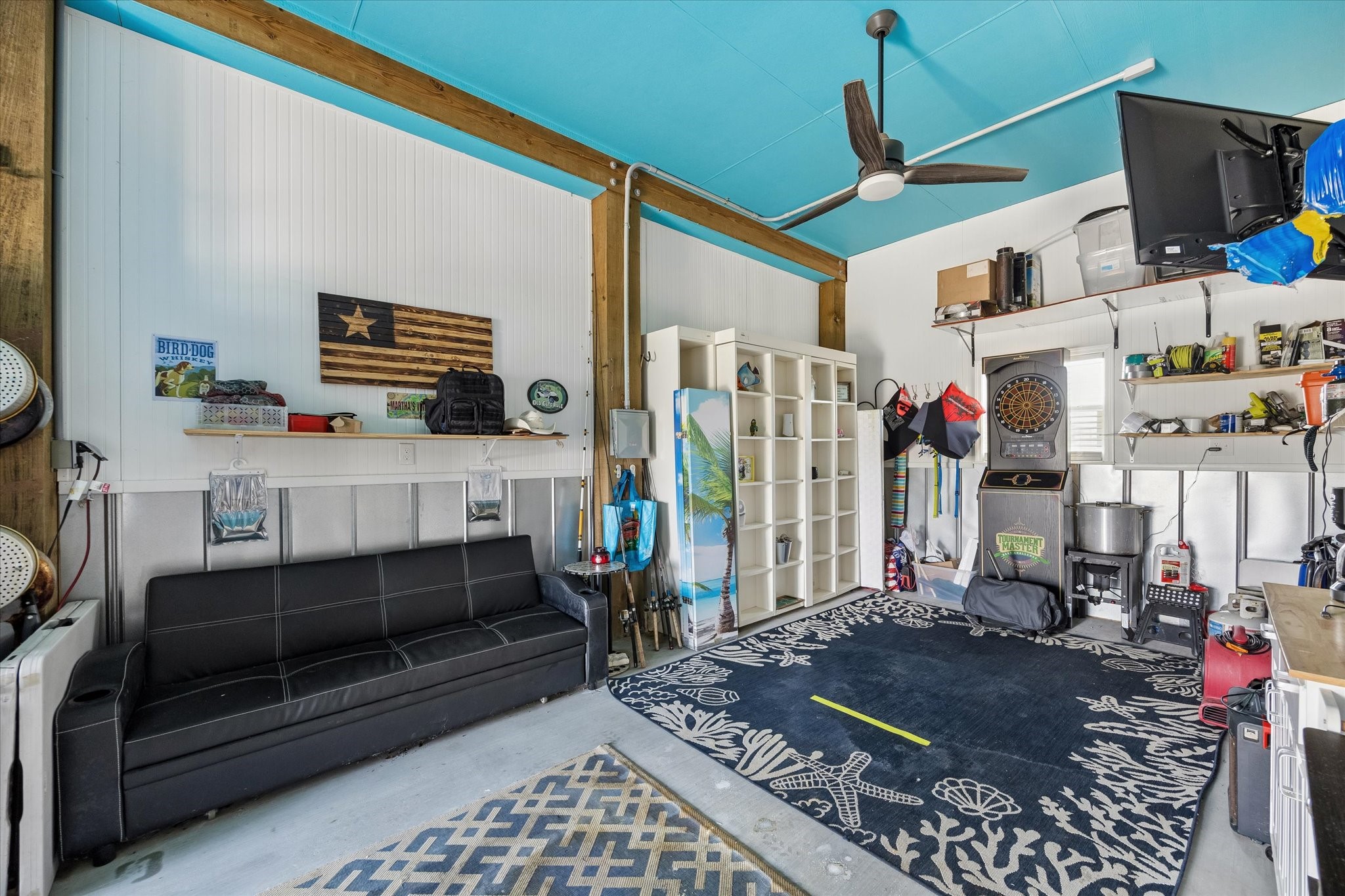 Versatile first-level space ideal for a lively game room, cozy sleeping quarters, or for extra storage and a golf cart!