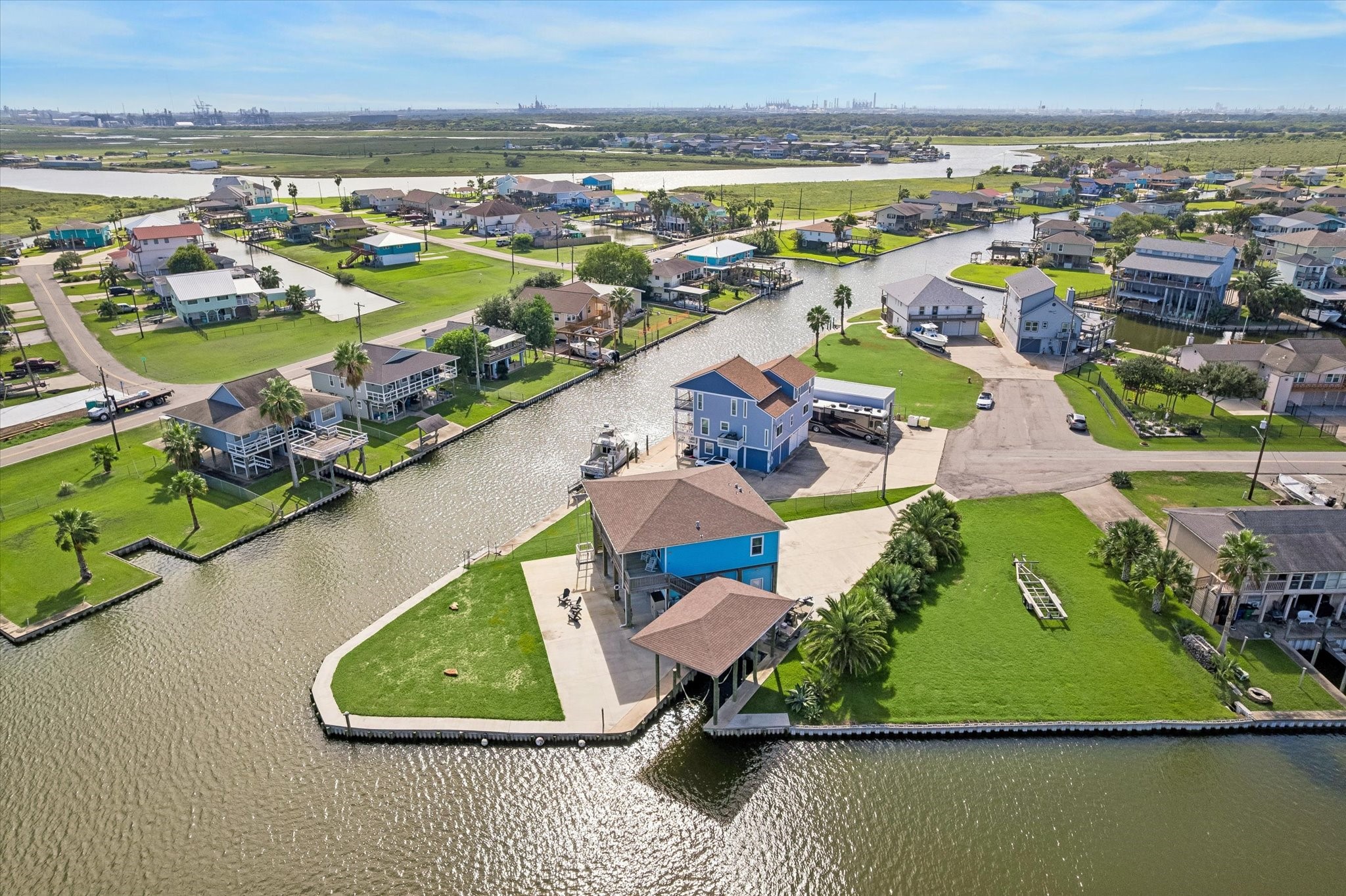 Waterfront living at its finest with this stunning property on a spacious corner lot, offering direct canal access and breathtaking views. Perfect for boating enthusiasts and those who enjoy serene water vistas.