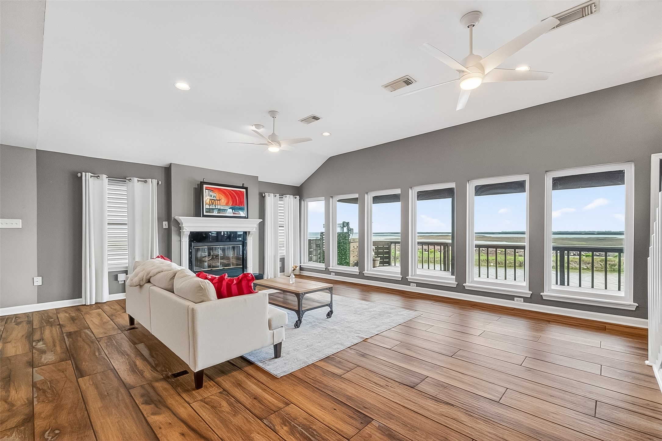 WALL OF WINDOWS- great natural light in the open concept living room! WALL OF WINDOWS- great natural light in the open concept living room!
