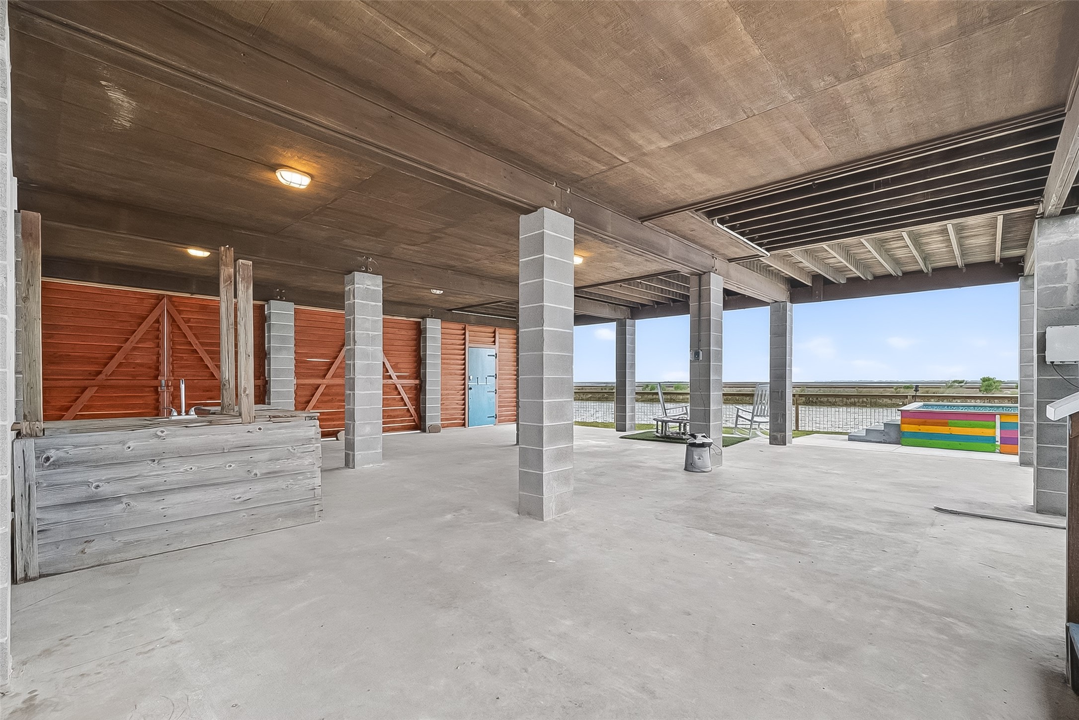 Covered entertaining area or additional covered parking! Both sets of louvers open