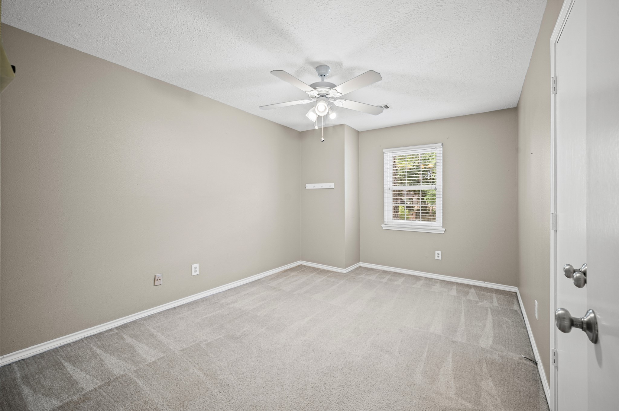 Fourth bedroom located upstairs.