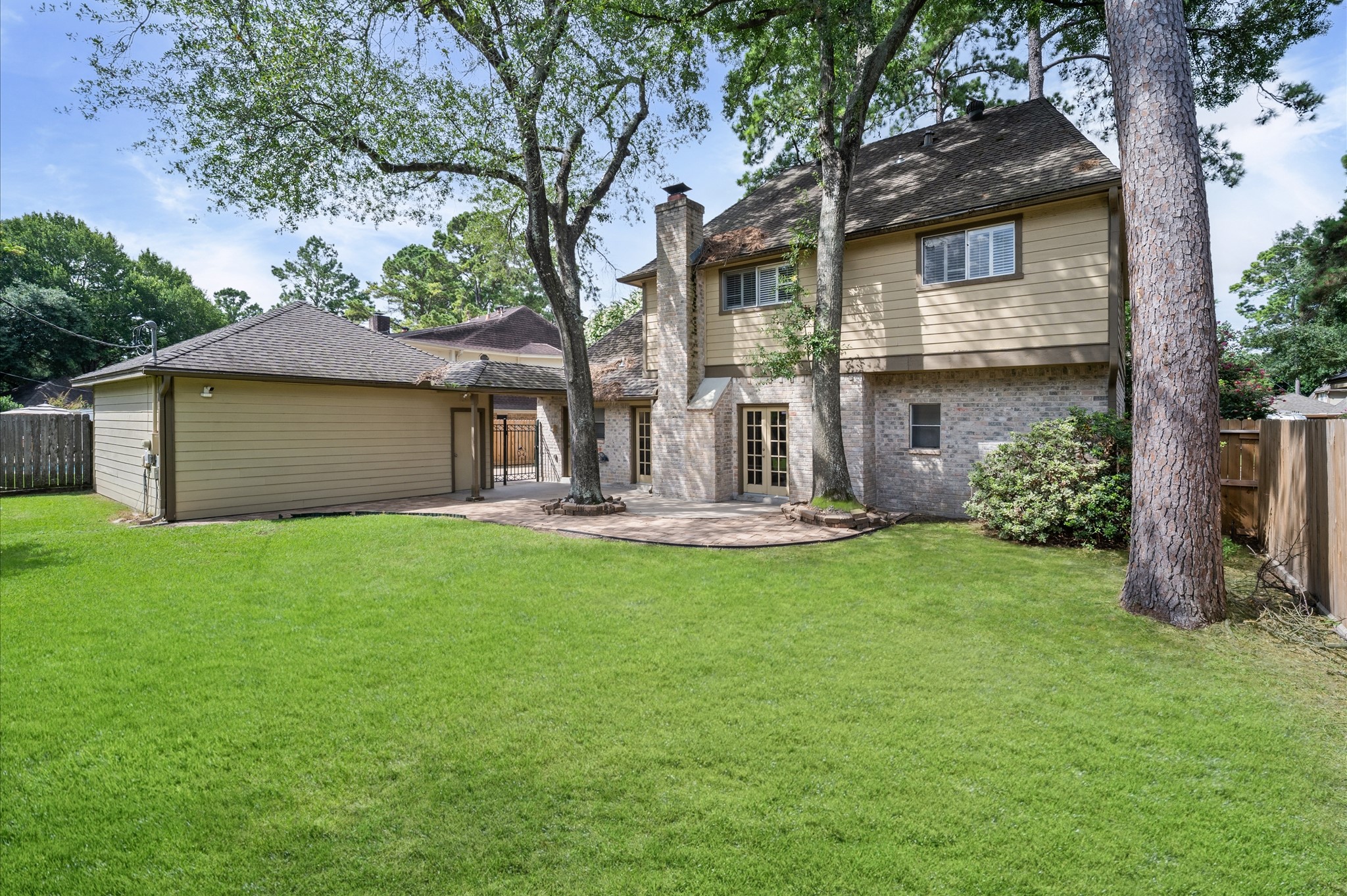 Back yard has plenty of space for outdoor cooking or play, and most definitely for your pet.
