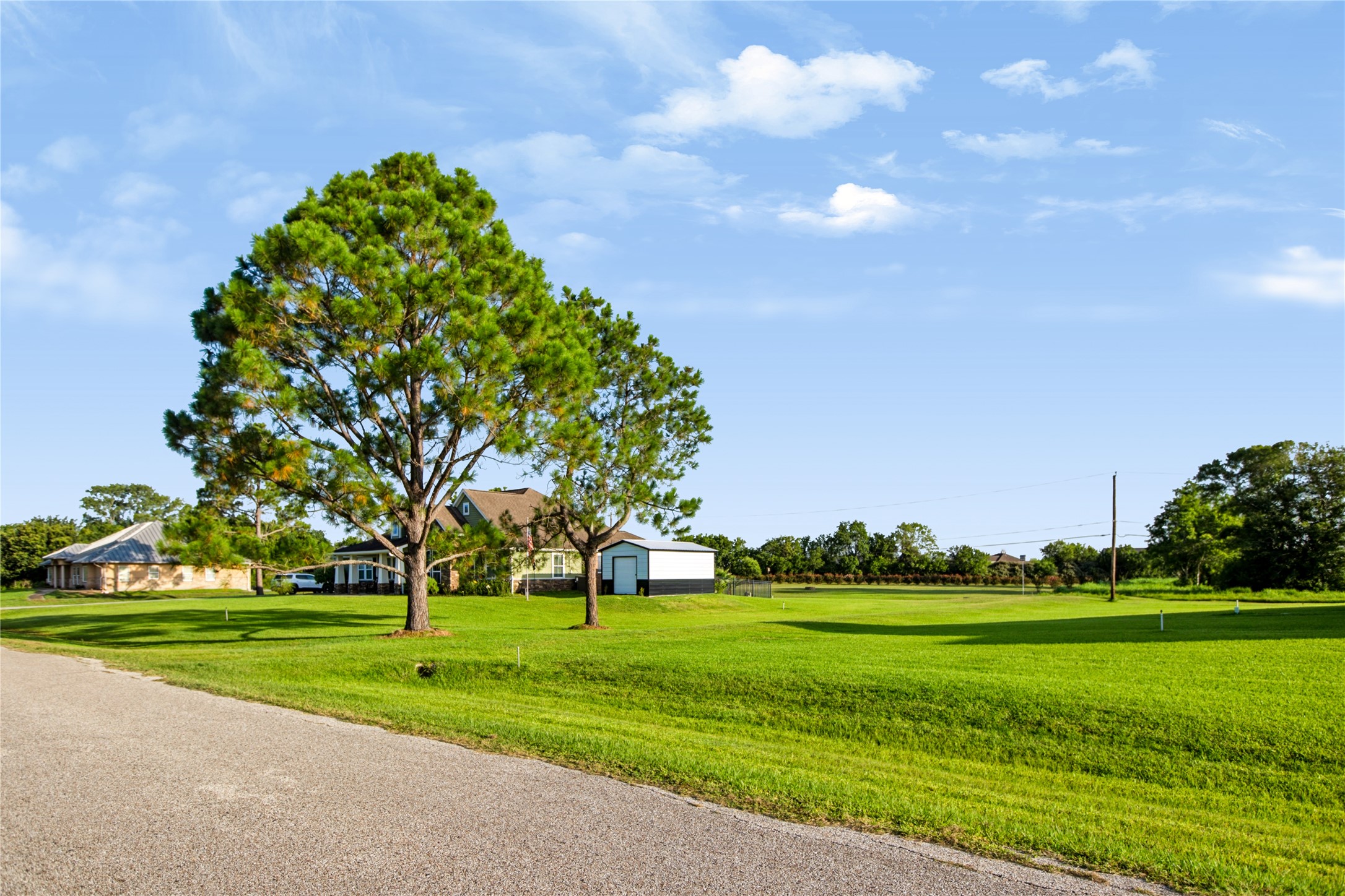 This 4.28 acres of property is located on the quiet cul-de-sac street of Penny Ln in Santa Fe, Texas.