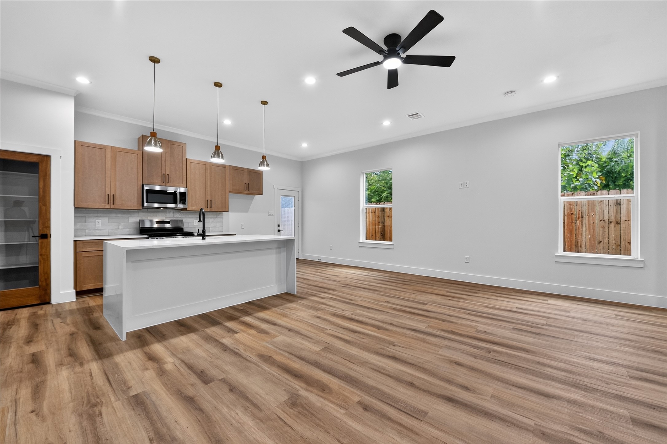 Clean, modern, and carpet-free throughoutthe home is designed for easy everyday living and entertaining.