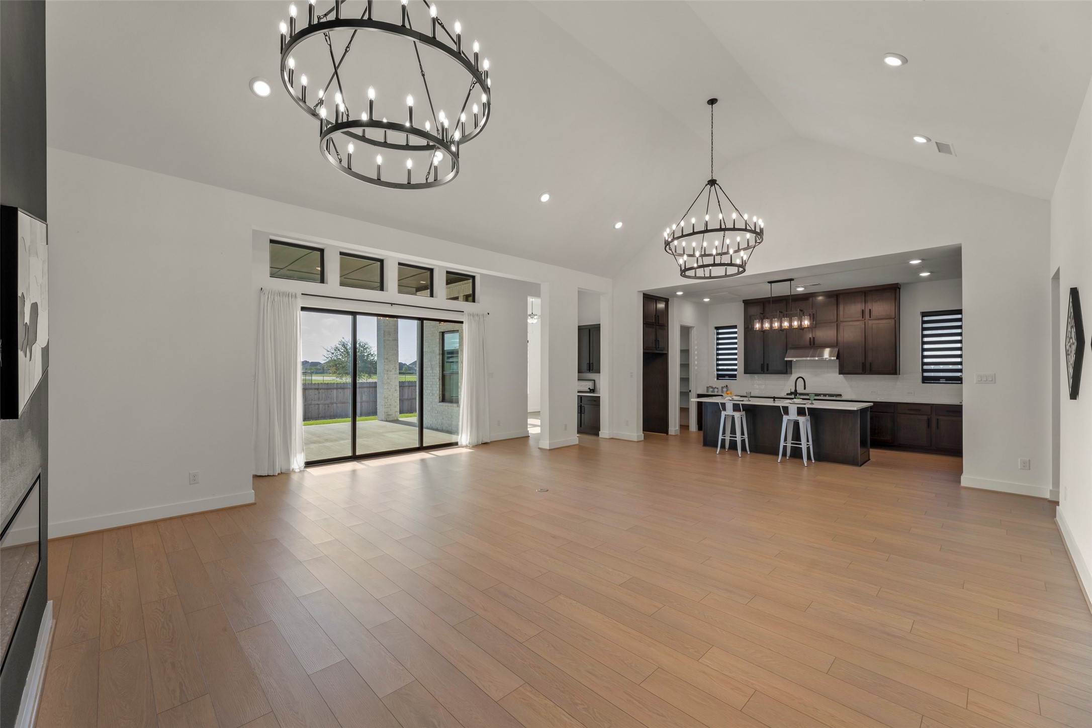 Abundant natural light from large sliding doors leading to the backyard in the living area.