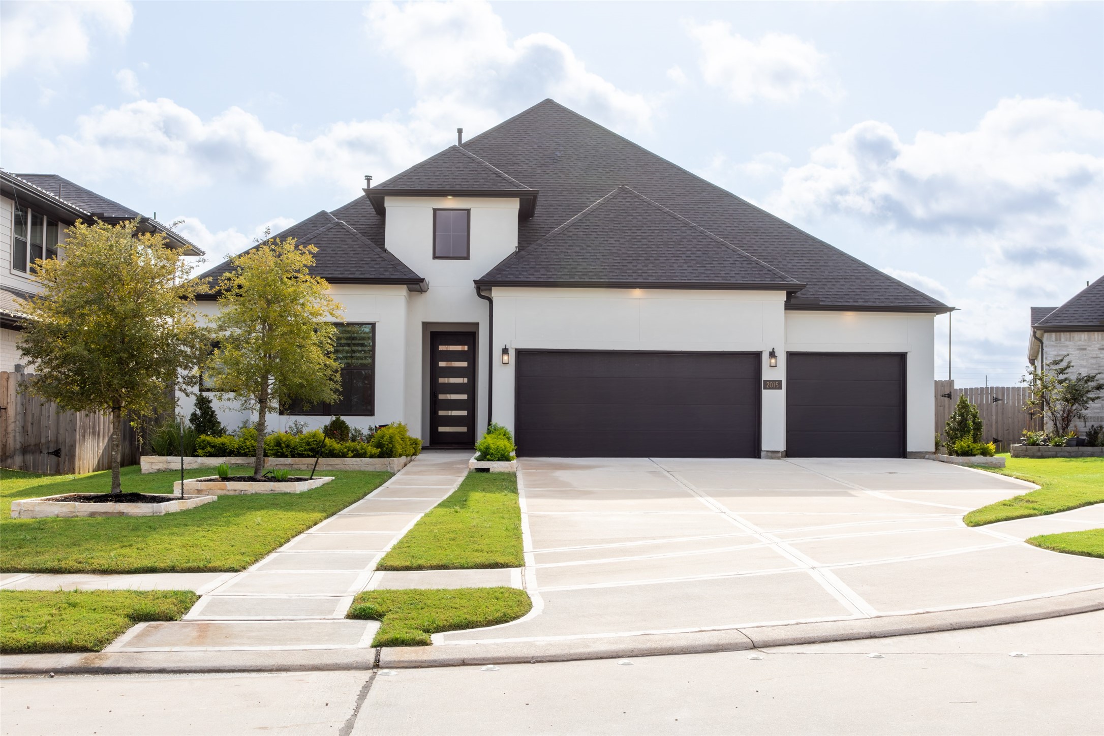 Well-maintained landscaping on a corner lot.