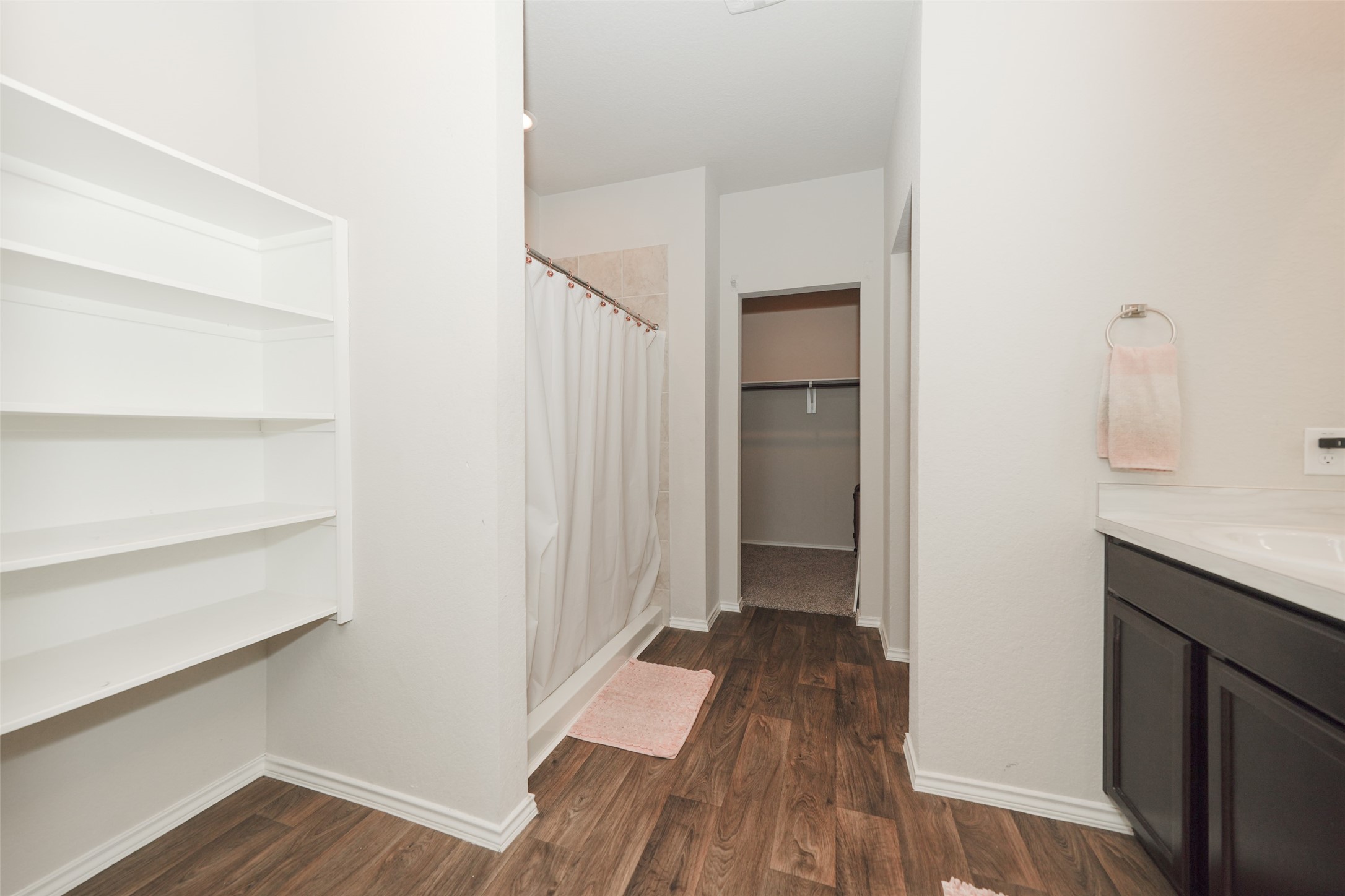 Great Shelving in Primary Bathroom