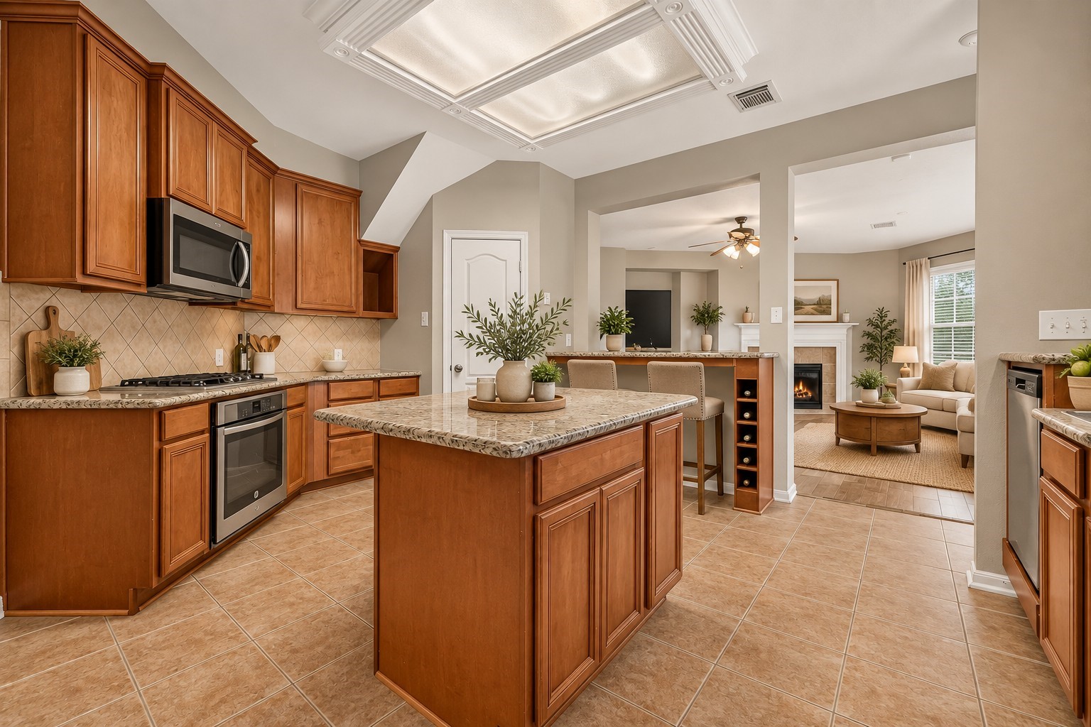 Located just off the family room, the kitchen features tile flooring and abundant cabinet space for everyday storage. A center island adds even more storage and provides a convenient workspace for meal prep and serving. **Virtually Staged**