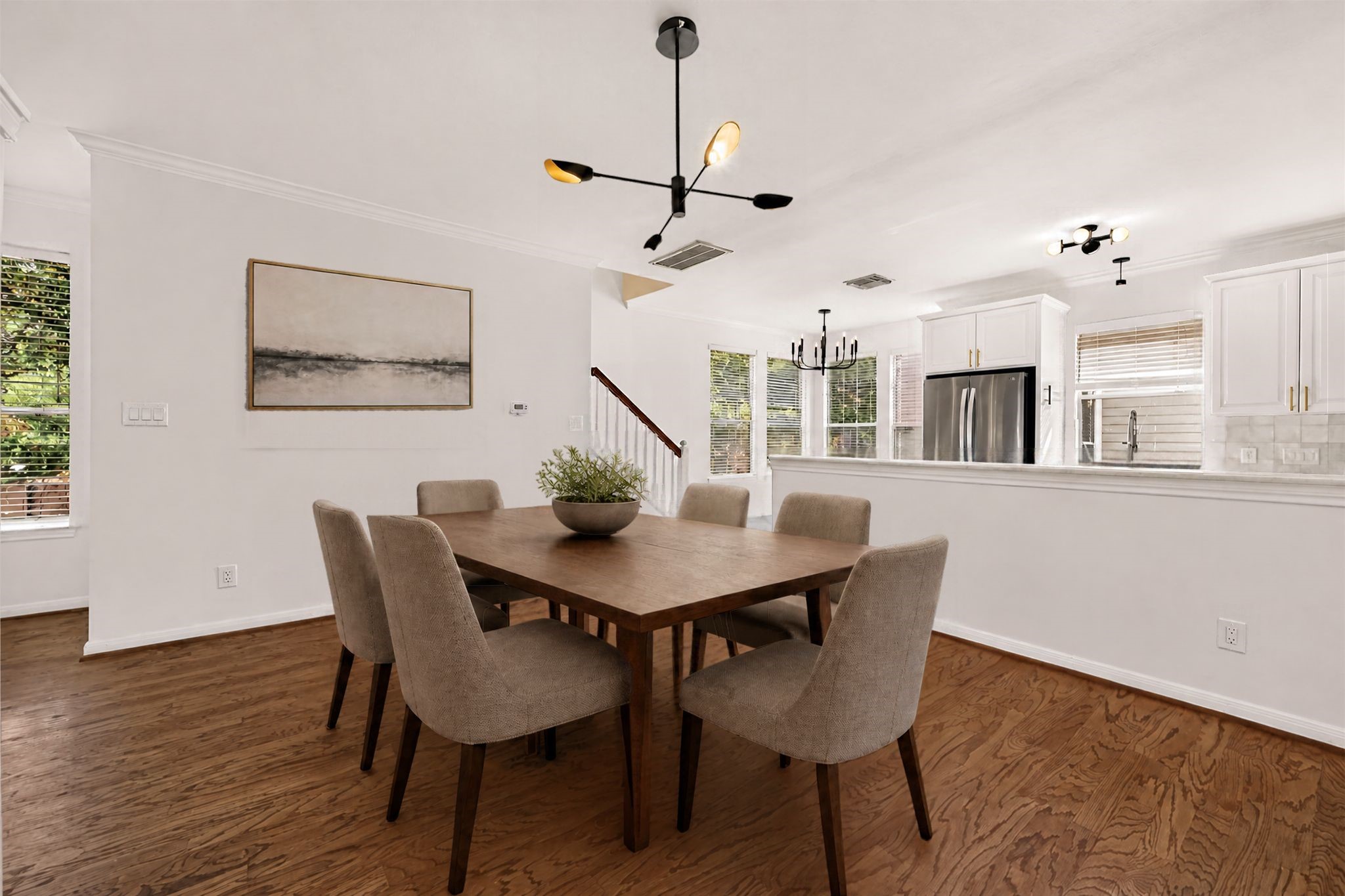 Virtually staged Dining room.
