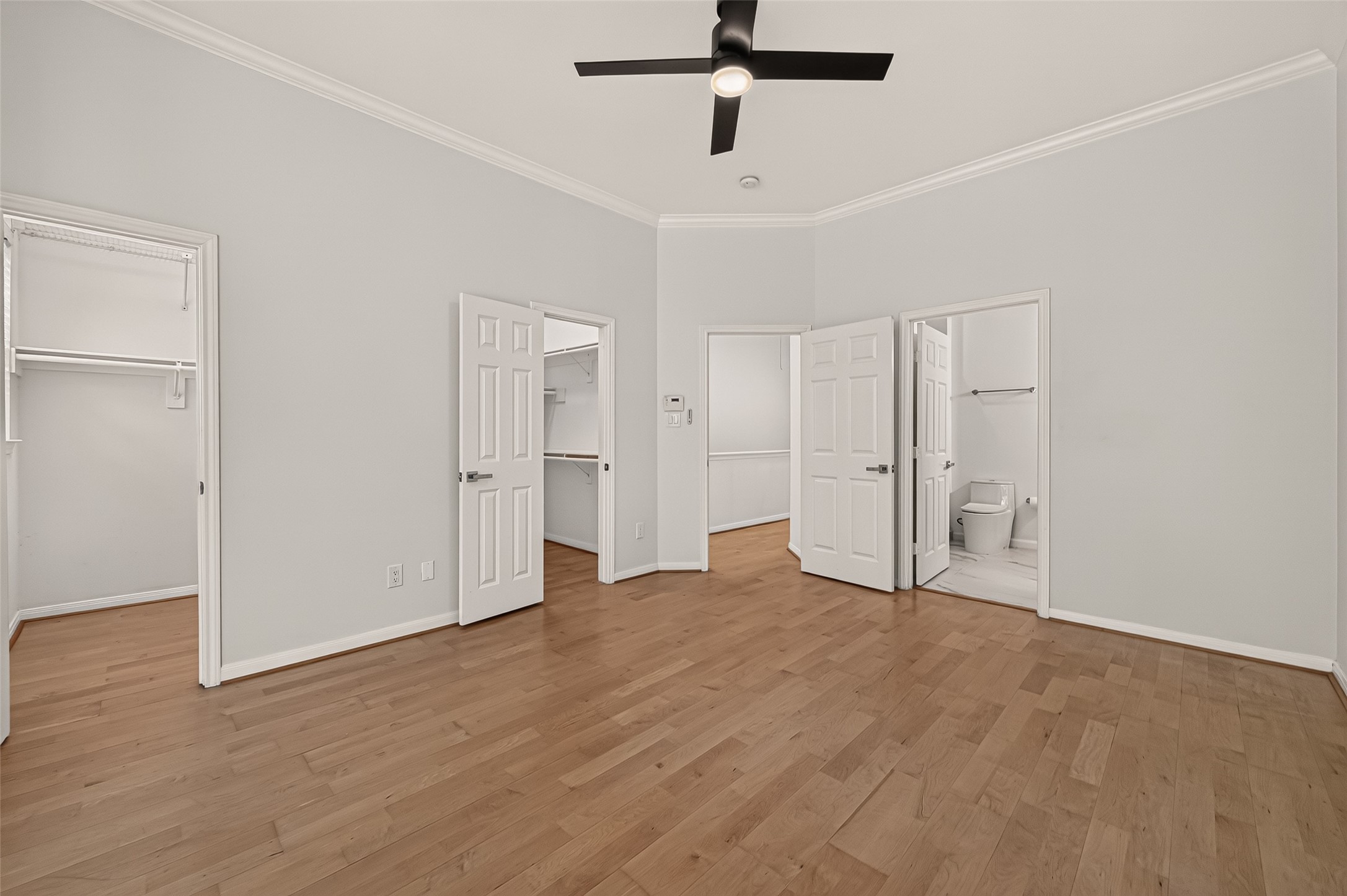 Another view of the primary bedroom.