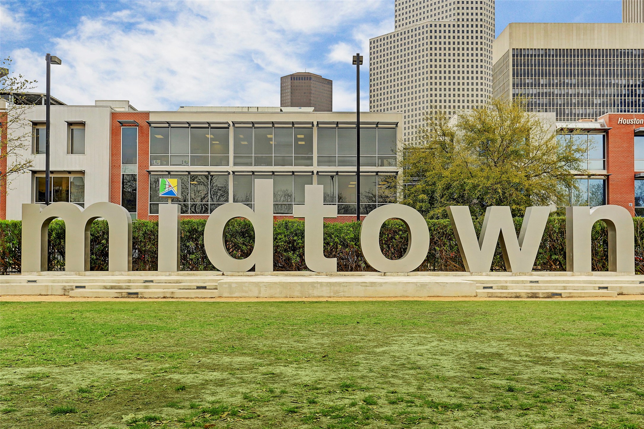 Midtown Houston, a lively urban destination surrounded by city streets, local businesses, and the energy of downtown living.
