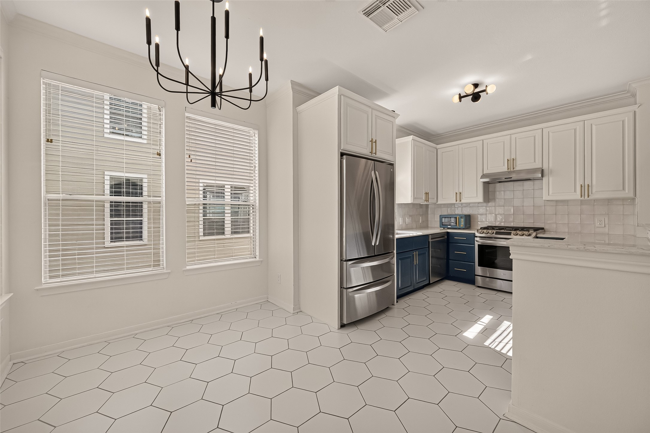 breakfast area leading into the kitchen.