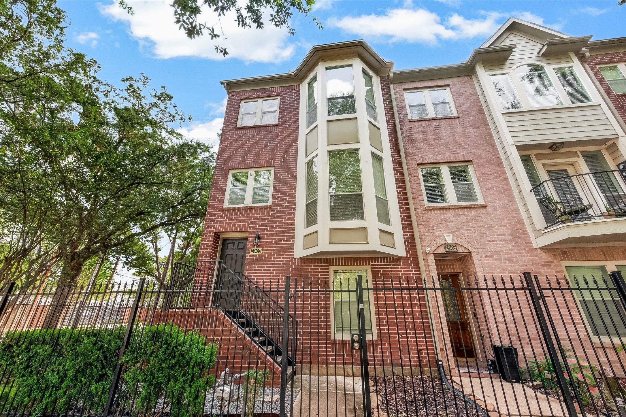 Come home to a charming exterior with a gated entrance and a sidewalk that leads you right to your front door. Come home to a charming exterior with a gated entrance and a sidewalk that leads you right to your front door.