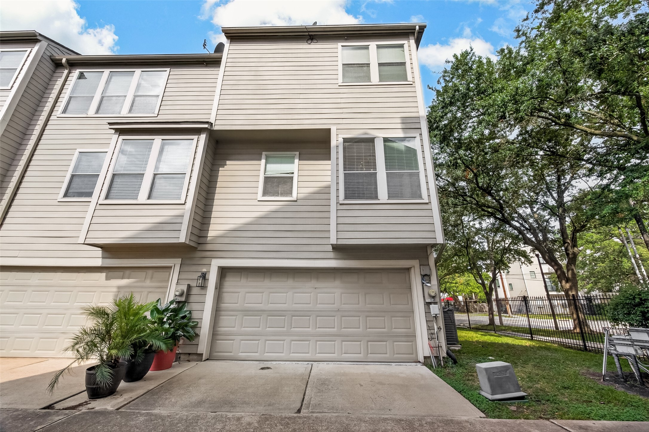 Corner unit, with a 2-car attached garage