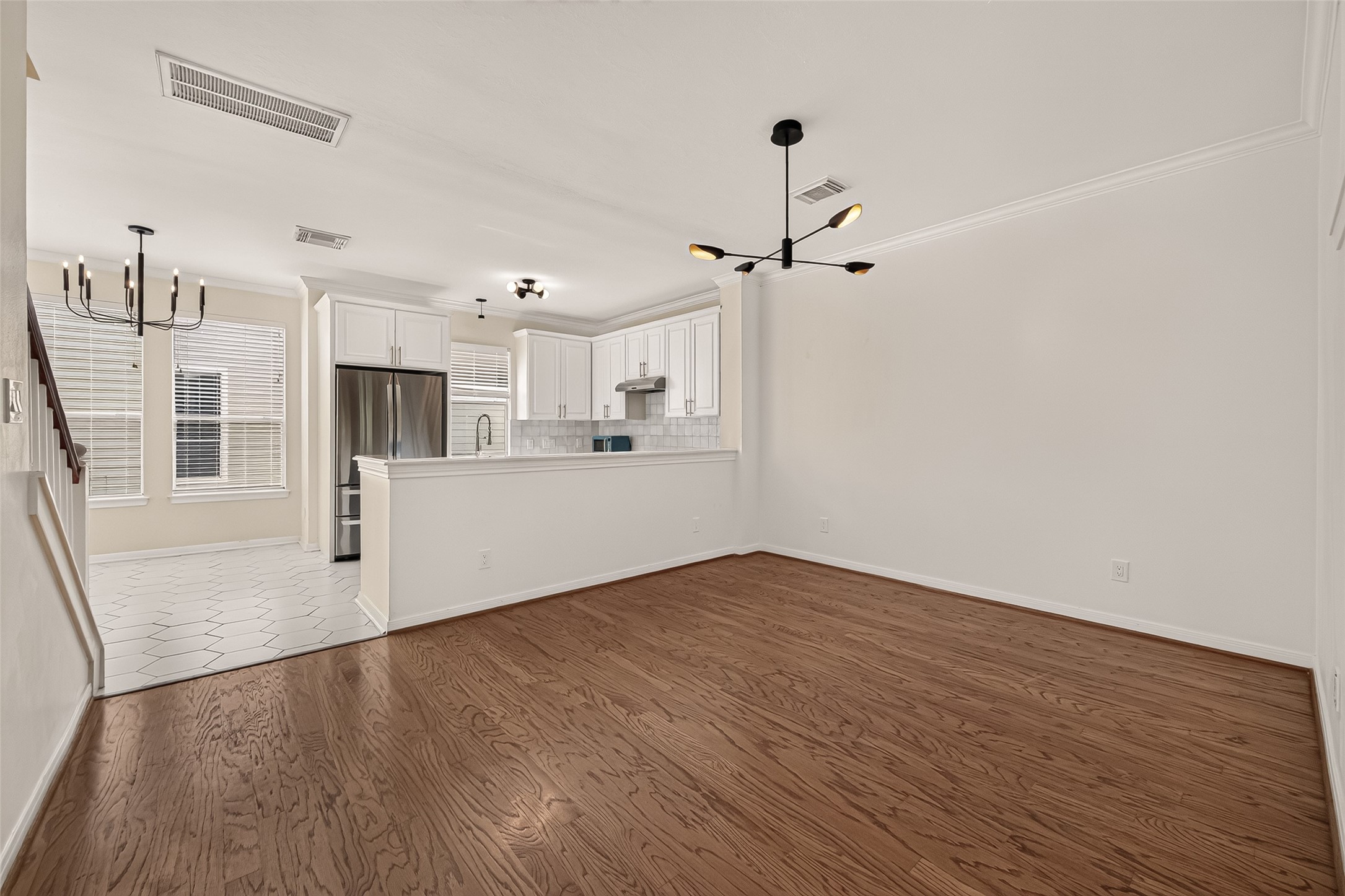 Dining room opening up to the kitchen entry.