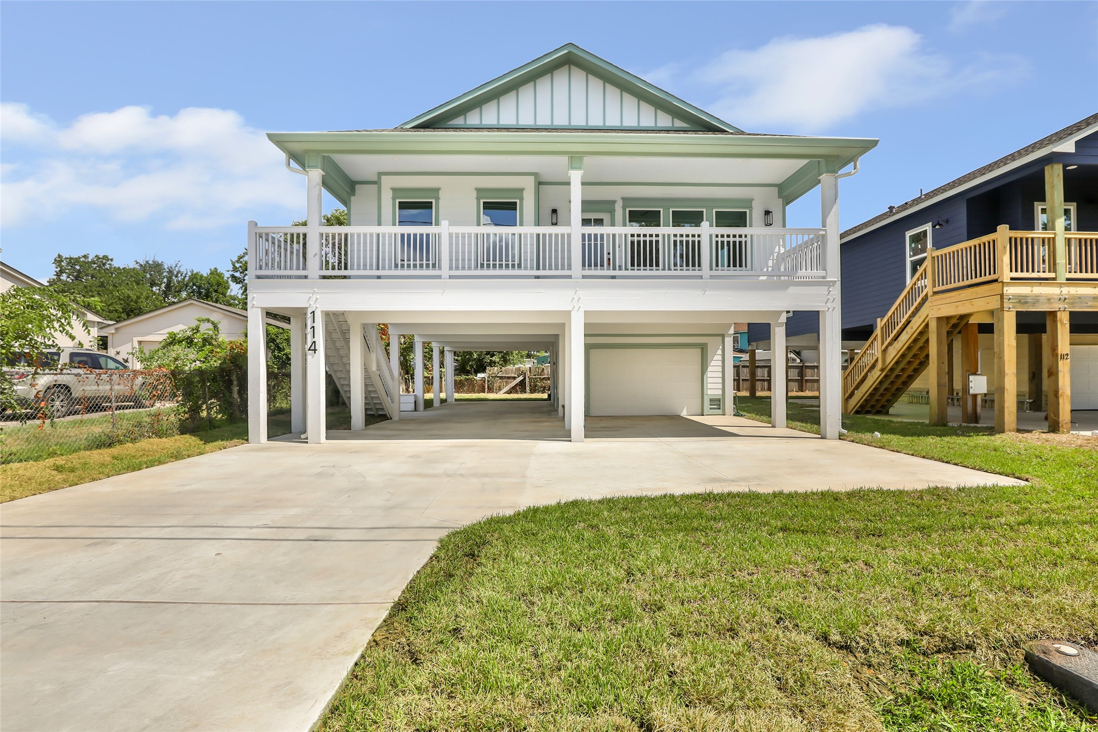 Charming elevated home with a spacious balcony, offering 4 bedrooms and 2 baths, perfect for comfortable bay living. Charming elevated home with a spacious balcony, offering 4 bedrooms and 2 baths, perfect for comfortable bay living.