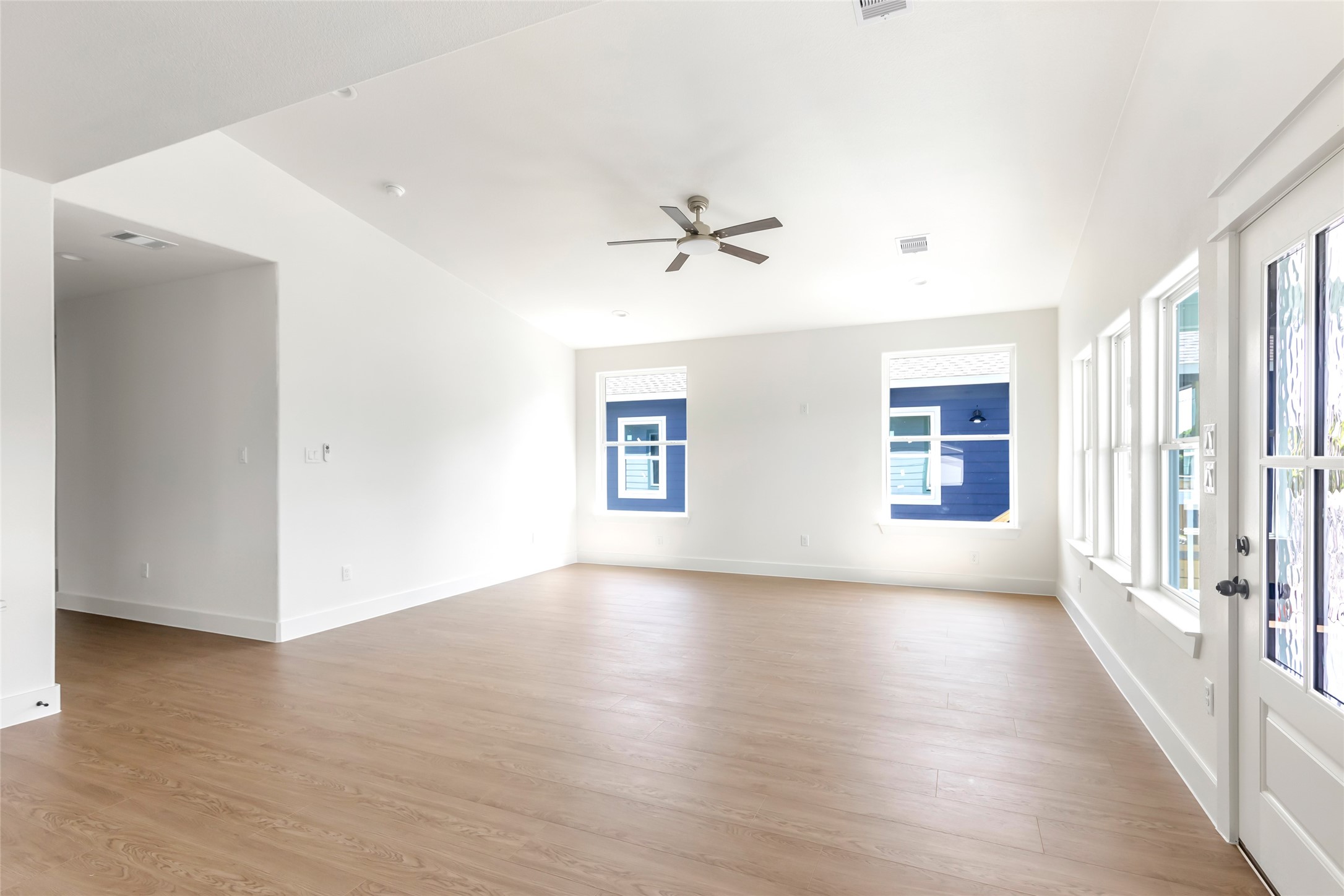 Vaulted living area with abundant natural light. Vaulted living area with abundant natural light.