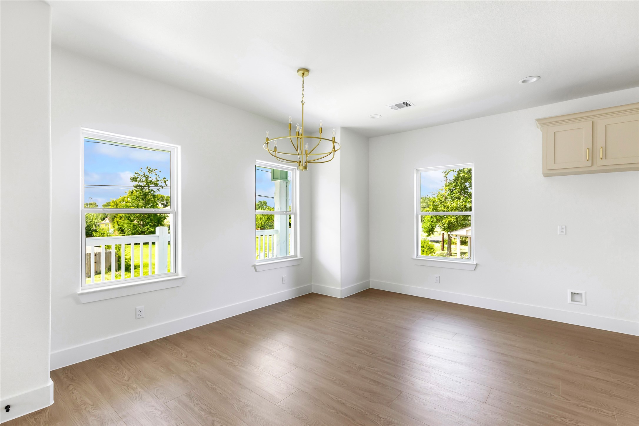 Bright breakfast nook with natural light and views. Bright breakfast nook with natural light and views.