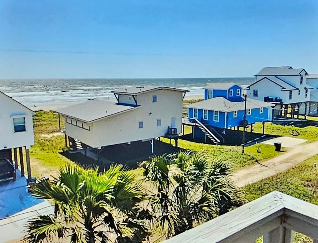 Beach view with a clear blue sky, showcasing proximity to the ocean. Ideal for coastal enjoyment.