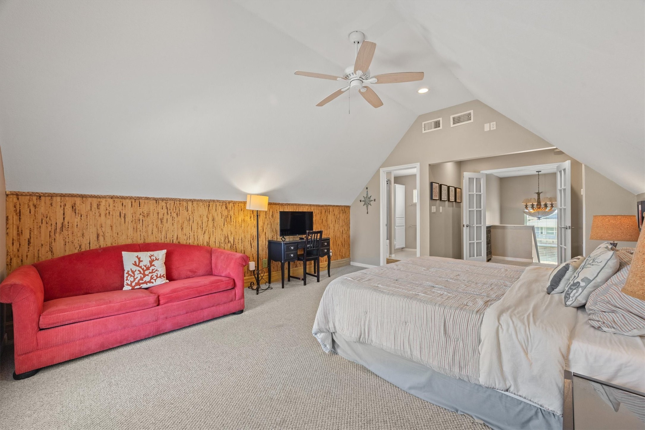 This spacious, airy bedroom offers the perfect blend of comfort and versatility.  It has ample room for a sleeper sofa for additional sleep space.  This private quarters is a cozy retreat for relaxation or hosting guests.