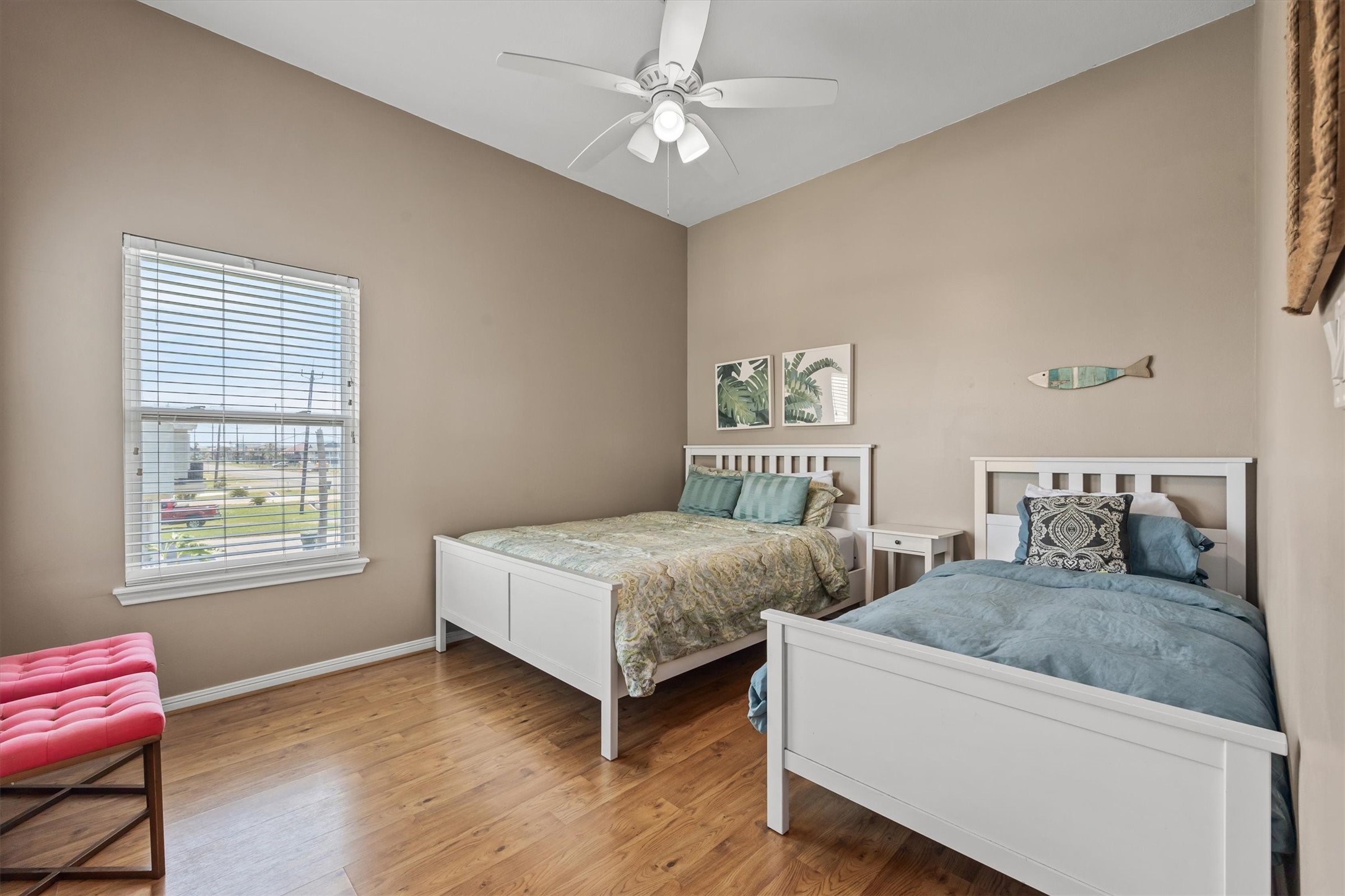 Discover another cozy and inviting Bedroom 2, featuring warm tones  and abundant natural light that creates a serene and welcoming atmosphere.