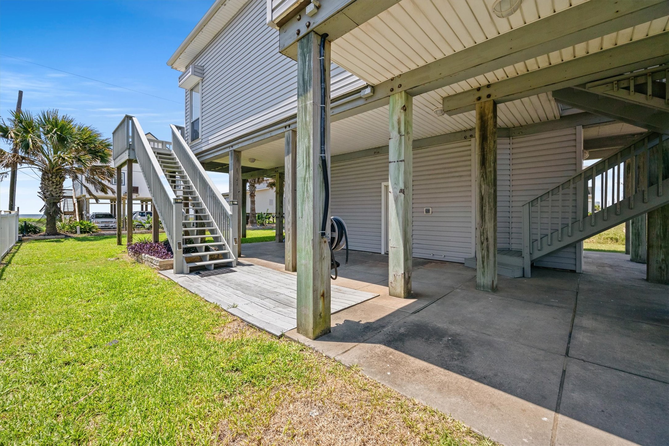 This inviting shady area is perfect for grilling, playing, and relaxing while soaking in the refreshing ocean breezes.