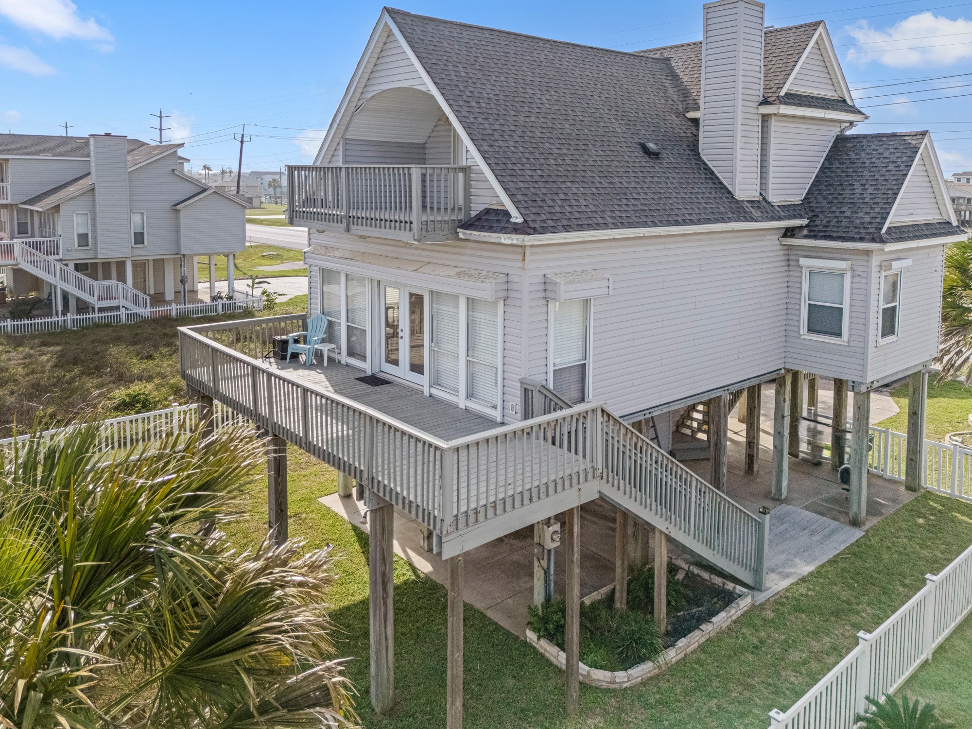 Note the two staircases, the storm shutters, two deck areas and the attractive design.