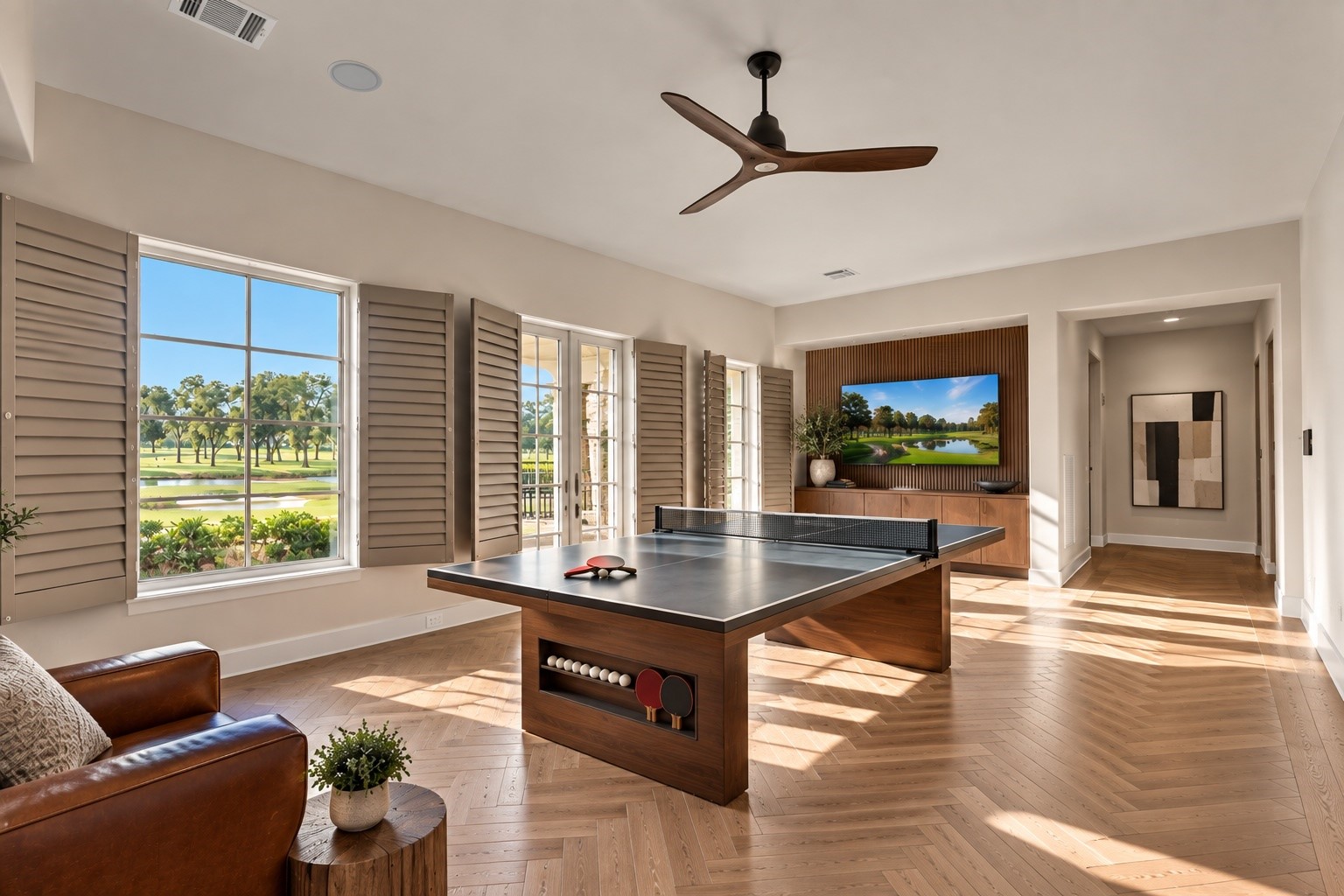 An impressive recreation and entertainment space features generous open floor area, natural light, and room for multiple activities, offering exceptional flexibility for both intimate and larger gatherings.