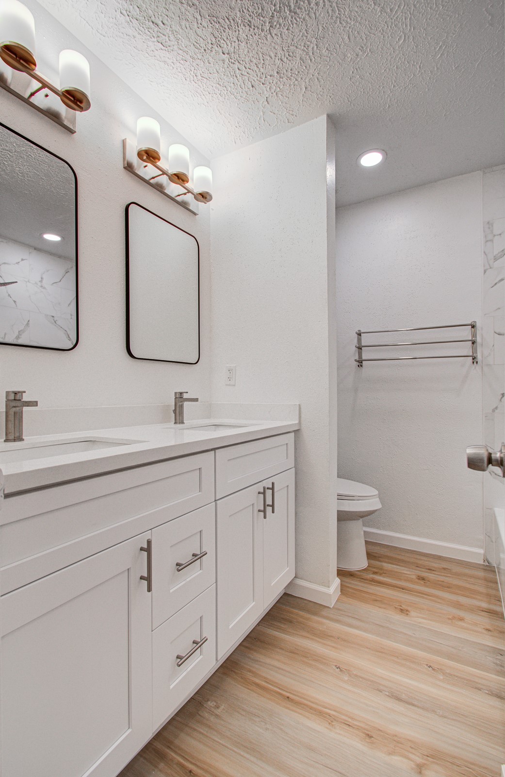 Second bathroom with dual sinks