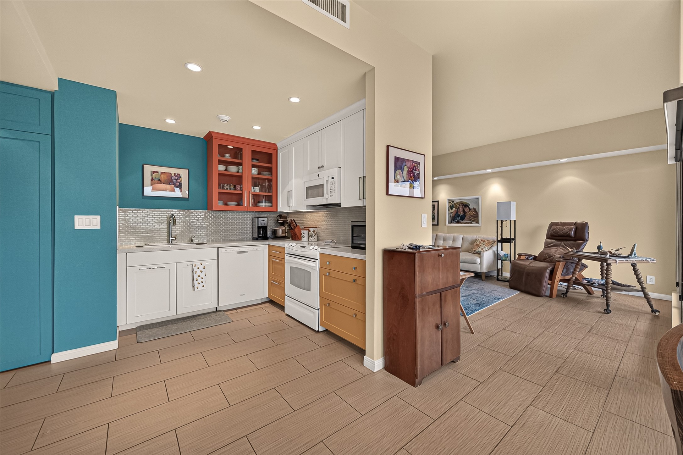 fresh, bright kitchen open to living and dining