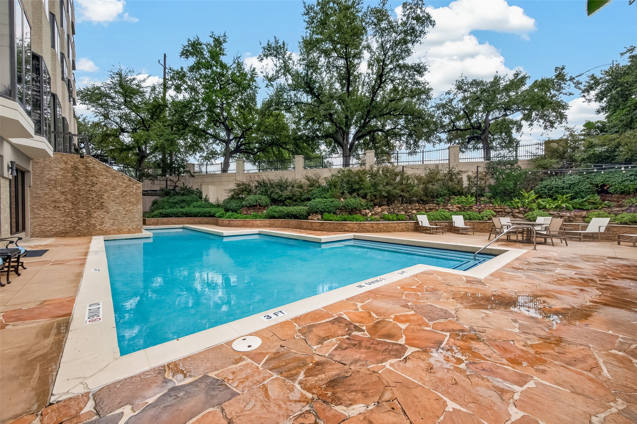 beautiful landscaping around the pool