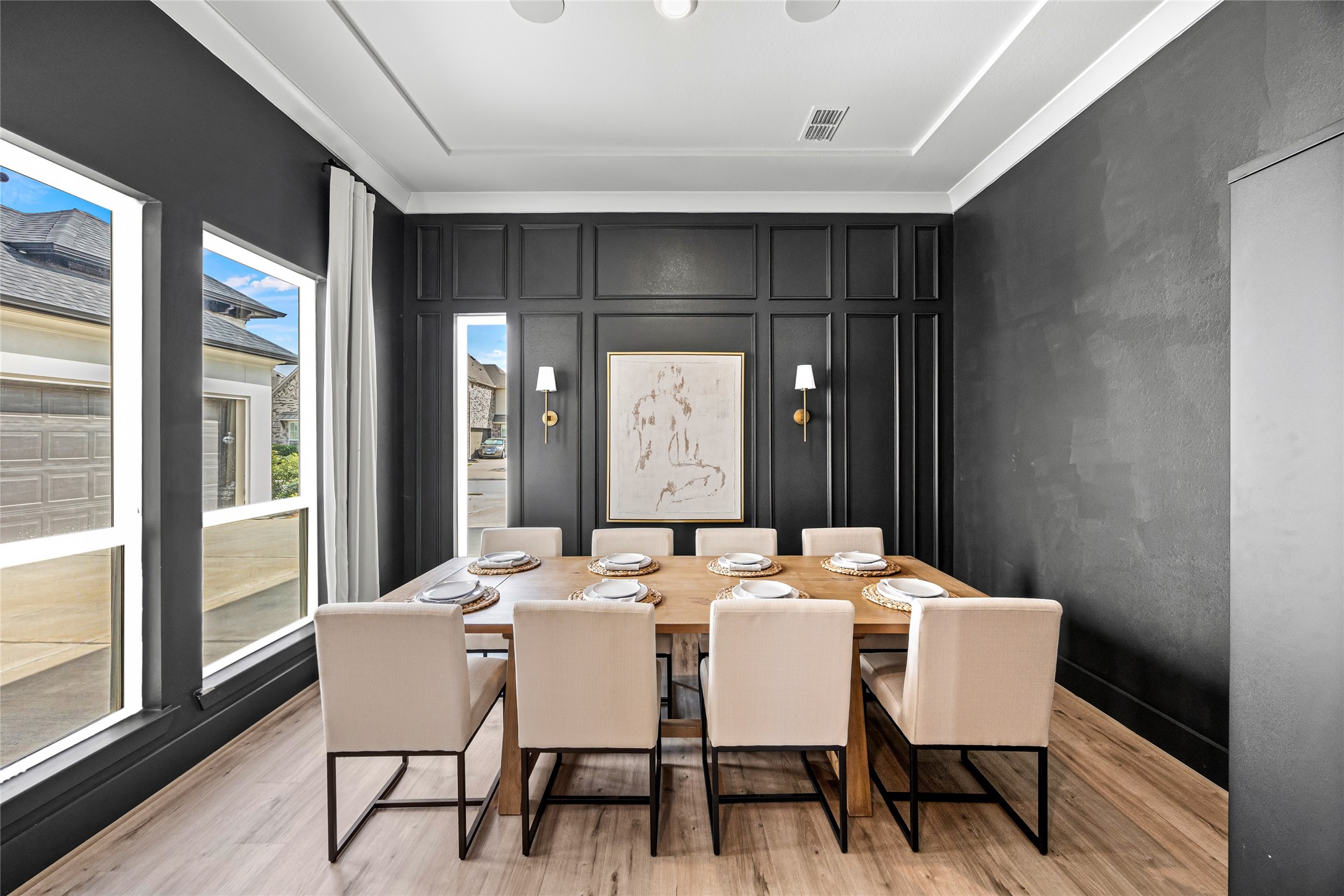 Dining room filled with natural light, creating an inviting atmosphere