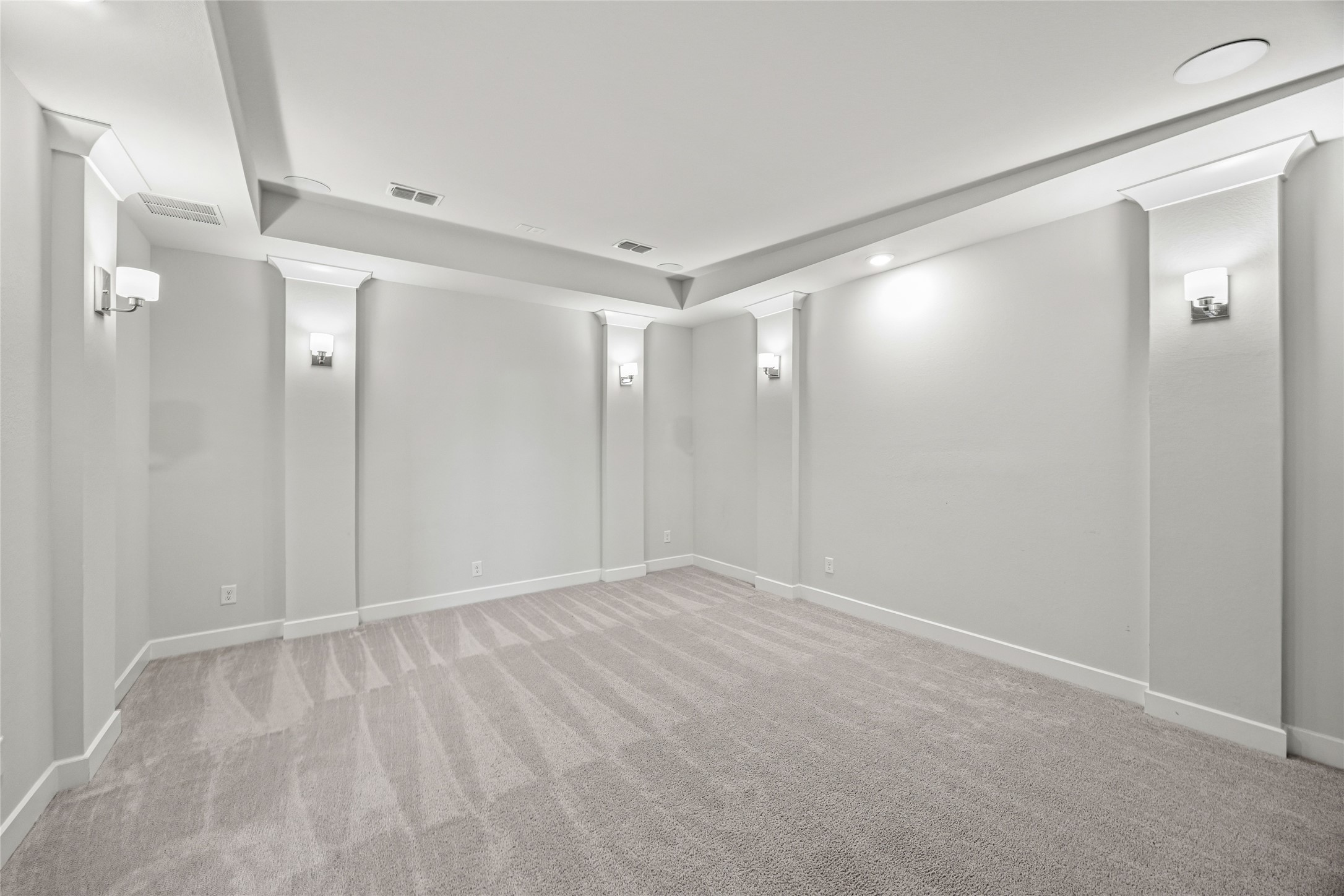 A large media room equipped with premium speakers, making every movie night feel cinematic